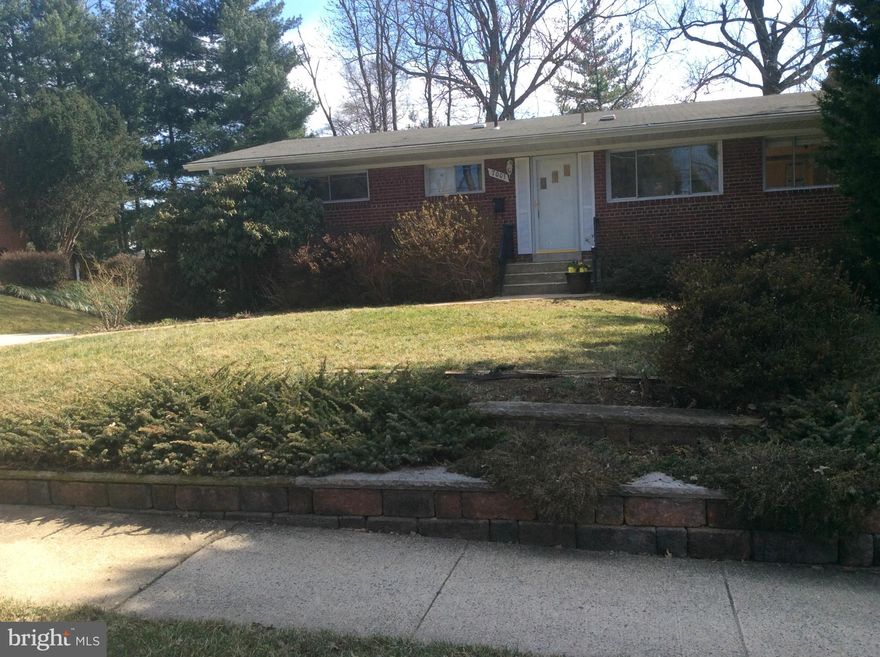 Wonderful lot & home in great school district! 4BR/3BA, 2 car side loading garage, cathedral ceilings, 2 tiered decking, hardwood floors (may need sanding), Big lower level w/tall ceilings, walks out to backyard (private), screened porch, baths may need some updating, tremendous value or option to tear down and build to suit.  Home being sold strictly as is but everything known to be working order