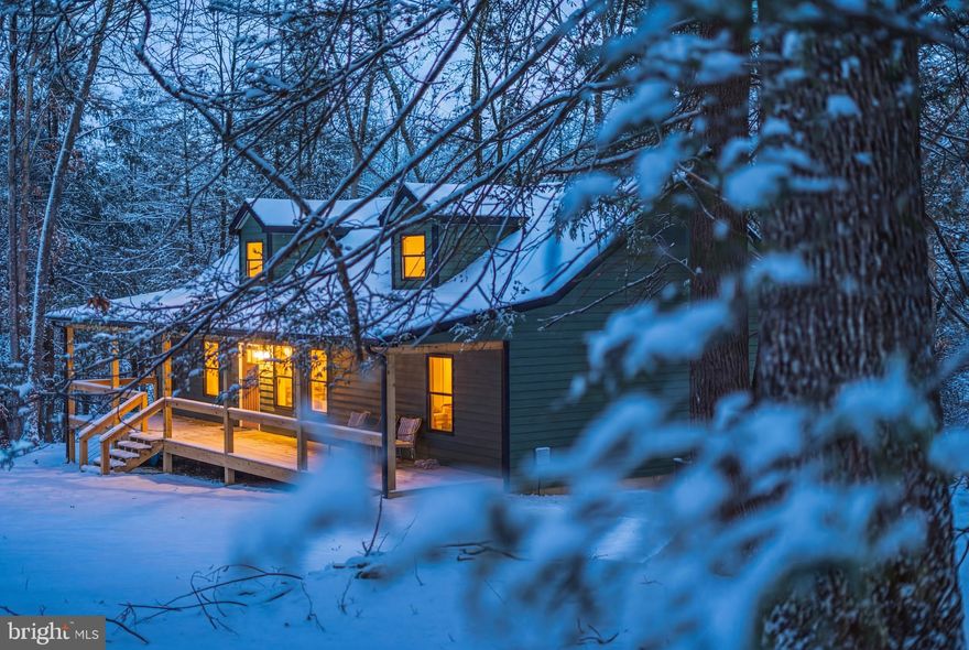 Built in 2025, this stunning open-concept home is nestled in the Meadow River Estates community — a picturesque neighborhood of newer custom homes set on generously spaced, wooded lots. With no HOA, you’ll enjoy both privacy and freedom.

Situated on a beautifully treed 1.16-acre lot, the property offers complete seclusion and overlooks a peaceful wooded valley, creating a true sense of retreat. Expansive covered porches span the full length of both the front and back of the home — the perfect setting to unwind and take in the calm beauty of this serene setting.

Inside, the home features an open floor plan anchored by a soaring vaulted ceiling that enhances the sense of space. Thoughtfully designed and newly completed in 2025, this residence is completely turnkey and move-in ready.

Perfectly positioned between New River Gorge National Park and Summersville Lake — and surrounded by multiple West Virginia state parks — this property offers exceptional access to world-class hiking, rock climbing, rafting, boating, fishing, and year-round outdoor adventure.

Whether you’re seeking a peaceful full-time residence, a luxurious weekend escape, or a high-demand vacation rental investment in one of West Virginia’s fastest-growing outdoor destinations, this home offers versatility, privacy, and prime location.