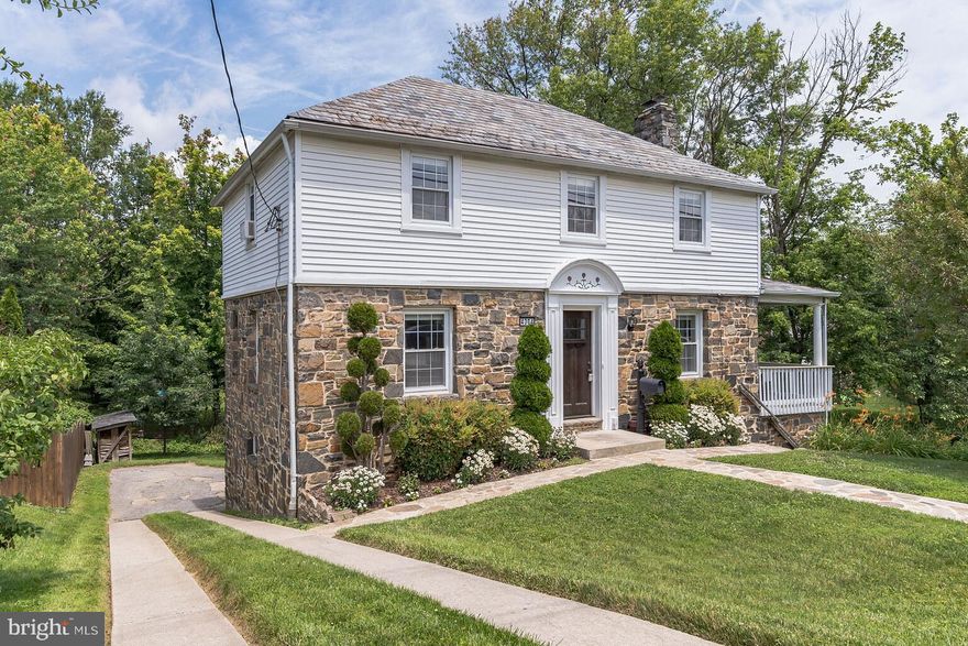Amazing value in this gorgeous, move-in-ready stone exterior home sitting on one of the largest lots in the sought-after Kensington neighborhood. Homes of similar size in this community have recently sold for 380K! Inside, you’ll find beautiful arched doorways, hardwood floors throughout the two main levels, a spacious dining room, and a tastefully finished kitchen with cherrywood cabinets, granite countertops, a black granite composite sink, under-cabinet lighting and stainless steel appliances. A stone surround wood-burning fireplace anchors the living room, and just steps away, a covered porch overlooks a private retreat-like backyard with its own serene creek. Upstairs, this 3 bed/2 bath home is nicely laid out. The main bedroom has his & hers closets, and the additional bedrooms are bright and spacious. The unfinished attic provides additional storage space and could be converted into a future office or a playroom. This great home has nearly 1700 SQFT of finished space in the two main levels, plus a basement equipped with ample storage,  a laundry area, and a mini room perfectly sized for a wine cellar. The windows have a transferable lifetime warranty. There's an attached one car garage with a rear entrance and a large driveway for multiple cars. Said best by the proud owner, "they don't make houses like this anymore".

This home has been loved and meticulously cared for by the owners for the past 15 years. The neighborhood is widely known for fostering a great sense of community and hosting fun events throughout the year. 

Located just a three blocks from shopping center, supermarket, restaurants, coffee shop, yoga studio, doctor’s offices, etc. Within minutes of I-95, I-695, I-70, MARC station, parks, country club, and much more! Easy commute to Baltimore, Fort Meade, Columbia, and the surrounding work hubs.