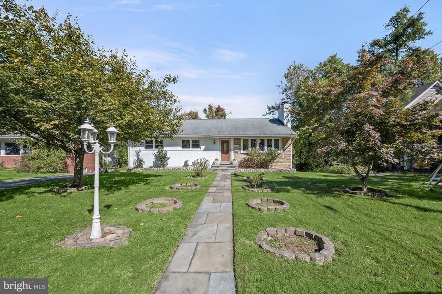 *** All estate documentation now in order, please contact listing agent if your client is interested in this popular property *** 9331 E Parkhill Drive is a charming Rambler home offering a popular layout in the sought-after Bethesda neighborhood of Parkview. This inviting residence includes a 2-car driveway and offers 4 Bedrooms and 3 Full Baths across 2 levels and 2,956 square feet of living space, boasting main level hardwood floors, crown molding and crystal light fixtures throughout. 

The welcoming front slate walkway, lined with greenery, guides both residents and guests to the Front Entrance. The Entry Foyer opens to the sizable Living Room, boasting beautiful bay windows, hardwood flooring, and a wood-burning fireplace; unwind and settle in for the upcoming holiday season in this cozy and comforting space. The Dining Area follows, presenting a crystal chandelier with a ceiling medallion as well; gather family and friends to celebrate a formal occasion or enjoy the everyday dining experience in this versatile and conveniently-appointed room. The Kitchen showcases vinyl tile flooring, oak cabinetry, tiled backsplash and stainless steel appliances; any at-home chef will be sure to enjoy this thoughtfully designed workspace. The adjacent Sunroom, drenched in natural sunlight from the walls of windows and sliding glass door, offers laminate parquet flooring and glass and brass light fixtures; enjoy quiet mornings over coffee or watch the leaves change in this truly special space. The Hall to the Bedroom Wing includes a Linen Closet, Coat Closet and the Main Level Full Bath, offering marble tile flooring, a pedestal sink, a tub shower with tile surround and an oversized shower head. The Primary Bedroom boasts a walk-in closet, hardwood floors underneath the carpet, and an ensuite Full Primary Bath, complete with a pedestal sink, marble tile flooring, a stall shower, Kohler toilet and mirrored medicine cabinet. The Main Level is complete with 2 Additional Bedrooms, both offering hardwood flooring underneath the carpet, a closet with mirrored doors, and a crystal light fixture. 

Descending the newly carpeted staircase to the recently renovated Lower Level, showcasing luxury vinyl tile flooring throughout, the spacious Recreation Room awaits, featuring built-in cabinets and shelves; from a Movie Room to an Entertainment Space to an At-Home Gym, the opportunities for this space are endless! This Level is complete with an Entry area with access to an attached Storage Room Addition, a Fourth Bedroom/Optional Office Space with paneled walls, a Full Bath with a stall shower, a Laundry Room with an under stair Storage Closet, and an unfinished Storage/Utility Room.

The verdant, fully-fenced Rear Yard presents a slate patio, an in-ground Pool (virtually opened in photograph) with a brick, pool terrace and a shed; enjoy al fresco dining and entertain at ease in this area designed for fun and relaxation! In close proximity to local parks and schools, NIH, Rock Creek Trail, Bethesda Row, and the Music Center at Strathmore, 9331 E Parkhill Drive offers entertainment, convenience and residential tranquility all in one coveted location.  

This property will be sold in “As Is” condition, and presents a wonderful template for a new owner.