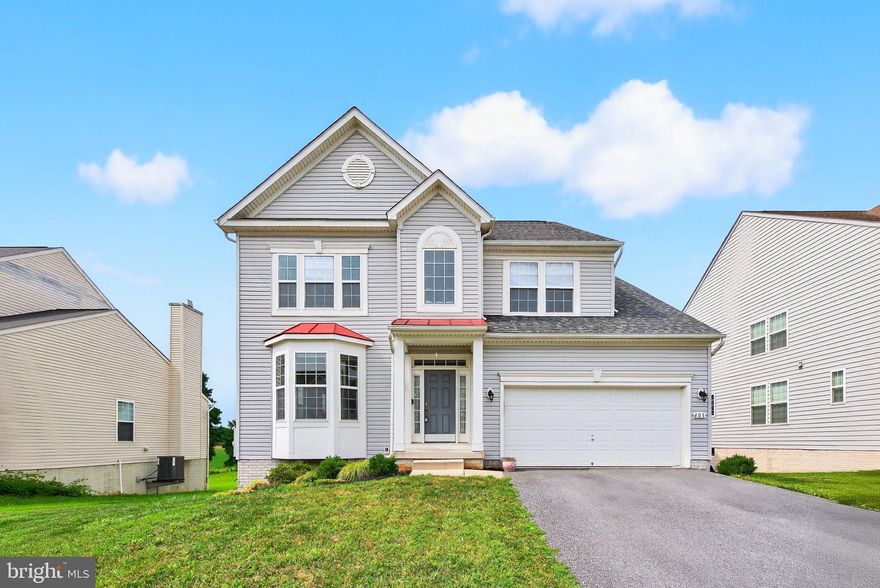 Welcome to this inviting 4-bedroom, 3.5-bath colonial in the sought-after Spruce Hill North subdivision of Charles Town. Built in 2010 and set on a .24-acre lot with peaceful views of rolling fields and trees, this home offers space to grow, modern updates, and everyday comfort in a quiet community setting.

Inside, you’ll find a mix of hardwood, ceramic tile, and carpeting that defines each space while creating a warm, livable flow. The heart of the home centers around the kitchen and family room—featuring granite countertops, newer appliances, and a fireplace perfect for cozy evenings. Just off the kitchen, the sunroom is a standout space—lined with windows, filled with light, and offering serene backyard views year-round.

Upstairs, the spacious primary suite includes two walk-in closets and an en suite bath with a soaking tub, walk-in shower, and double vanity. Three additional bedrooms and a convenient second-floor laundry room provide flexibility for family, guests, or remote work.

The walkout basement expands your options with two large finished rooms, a full bath, and French doors leading to the fenced backyard. A separate storage area provides plenty of room to keep things organized without sacrificing living space.

Additional highlights include a bay window at the front of the home, crown molding, vaulted ceilings, a two-car garage, and a white vinyl fence. With a prime location near commuter routes, shopping, and the charm of historic Charles Town, this home is ready to welcome its next chapter.