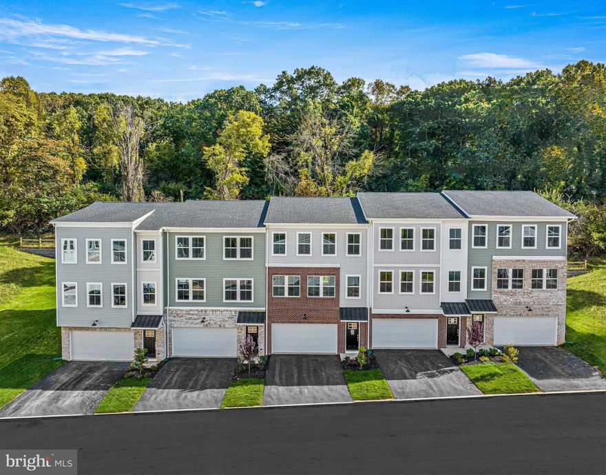Start your 2024 off with a bang with this early January move-in. 63 Four Leaf Drive is a truly exceptional  home thoughtfully designed to cater to your contemporary lifestyle. From the moment you enter, you'll be struck by the intelligent layout that offers unparalleled adaptability. The entry level presents a finished space that's ripe with possibilities perfect for a home office, media room, gym, or even guest quarters. The potential here is boundless, allowing you to shape it to your unique needs and preferences. Moving to the upper level, you'll be greeted by a bright and spacious kitchen that's a dream for both entertainers and those who value everyday convenience. This well-appointed kitchen boasts 42" cabinets adorned with elegant crown molding, a chic subway tile backsplash, and quartz countertops. Step out onto the deck, seamlessly blending indoor and outdoor living. The dining area gracefully transitions into the expansive great room, offering abundant space for relaxation and entertainment. The bedroom level of this well-conceived home is the epitome of comfort and practicality. The primary bedroom serves as a true retreat, featuring an en suite bathroom and an exceptionally spacious closet designed to accommodate all your storage needs. Prepare to start and end your day in style within this generously proportioned and inviting primary suite. Adding to the convenience, the laundry is strategically situated on this level, making daily chores a breeze and eliminating the need to haul laundry up and down stairs. Down the hall, two generously sized bedrooms offer flexible spaces that easily transform into ideal home offices, fostering an environment that promotes both productivity and tranquility. The presence of a shared hall bath ensures the comfort and convenience of all occupants. This home seamlessly combines modern living features, adaptability, and comfort to provide a living experience that is truly exceptional.** Call to schedule your appointment today to find out why so many people have already made Clover Mill their home.  Proudly served by Downingtown School District! (Pictures are of model home and for representational purposes only. Details will vary. See New Home Consultant for details.)