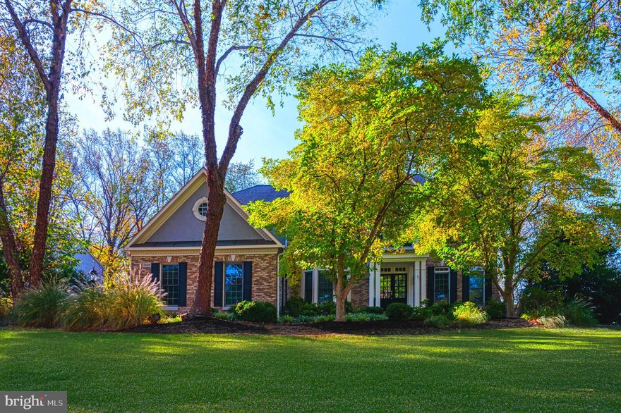 Pool is open for the season! Your dream retreat awaits! Tucked on a breathtaking 0.86-acre lot, this over 5,000 sq. ft. home delivers the perfect blend of luxurious indoor living and a resort-style backyard oasis. Lounge in the shimmering gunite pool, privately fenced and surrounded by lush landscaping—then explore the additional expansive yard beyond, perfect for recreation or relaxation.

Inside, classic center-hall colonial design meets modern elegance. A dramatic two-story foyer opens to formal living and dining rooms, while the sunlit family room impresses with a wall of windows, cozy gas fireplace, and access to a custom no-maintenance deck (new wood/stained 2024) that spans the width of the home. Multiple zones for dining, lounging, and taking in the stunning pool and serene rolling landscape make this space perfect for entertaining. The private home office is tucked away with grand windows, offering a peaceful workspace.

There is also direct access to and and from deck to the updated  kitchen  with breakfast area (2025) features new appliances, new flooring, a custom designer backsplash, and a 6-burner Viking cooktop on the center island. The bright breakfast area is wrapped in windows and includes a convenient back staircase,

Upstairs, the grand primary suite offers a private sitting room, walk-in closet, and a luxury bath with dual vanities, a soaking jacuzzi tub, and a glass shower. Three additional bedrooms include one ensuite, plus a third full bath and a dedicated laundry room with backyard views.

The finished walkout lower level adds even more lifestyle flexibility—windows for great natural light, a kitchenette for entertaining and poolside convenience, a soundproofed home theater (12+feet screen and Cannon projector convey), and a full bathroom with extra laundry hookups perfect for guests. Step out to the screened outdoor living room, leading directly to the pool patio and gardens—ideal for seamless indoor/outdoor hosting.

Located just 2.3 miles to the Metro, this property offers unbeatable convenience to Reston Town Center, Great Falls Village, Lake Fairfax Park, and major commuter routes to D.C., Tysons & Dulles. Nestled in the quiet Woodlands Estate community on the Vienna/Reston border, enjoy nearby woodland paths connecting to the Reston trail network, Lake Anne, and The Water Mine.

There are two bus stops: While the home is in the South Lakes High School IB district, a Langley High School bus stop is just three houses down—offering additional flexibility for those who prefer AP (check with fcps.edu ) 

This is resort living at home—meticulously maintained, exquisitely updated, and ready to enjoy from day one. All major items have been recently replaced, roof (2024), water heater (2025),  pool heater (2025), pump (2023), upper hvac (2020), kitchen update & most appliances (2024). See complete list in documents. Interior photos will be posted on 4/10. Ready for showings starting 4/15.