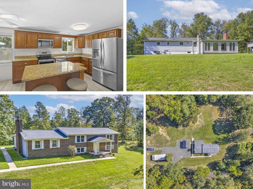 Welcome to this extraordinary 29.5-acre wooded estate offering the perfect blend of craftsmanship, updates, and endless possibilities. Step inside the 2,700+ sq ft home and immediately admire the fine details, including the striking cedar beam accent and dual stairways that set the tone for its timeless character.  At the heart of the home, the expansive kitchen impresses with sleek tile flooring, granite countertops, stainless steel appliances, and abundant cabinetry and counter space—a true chef’s dream. You’ll find an exquisitely updated guest bath, generously sized bedrooms, and a large owner’s suite complete with a walk-in closet and a spa-like en-suite showcasing floor-to-ceiling tile and a walk-in shower.  The main level offers plenty of room to gather, with a large dining room, spacious family room, and a one-of-a-kind all-season room. The finished basement adds even more versatility with a cozy wood stove, three additional bedrooms, and a fully updated bathroom.  Outdoors, enjoy two open field areas ideal for recreation, gardening, or even horses. A detached enclosed workshop with a separate 200-amp service provides the perfect space for hobbies or extra storage. Wildlife watching, gardening, or simply relaxing—this property invites you to live your dream lifestyle.  Practical updates include a newer roof, A/C, furnace, well pump, and hot water heater for peace of mind. All of this just minutes from shopping, dining, Pax River, and more!