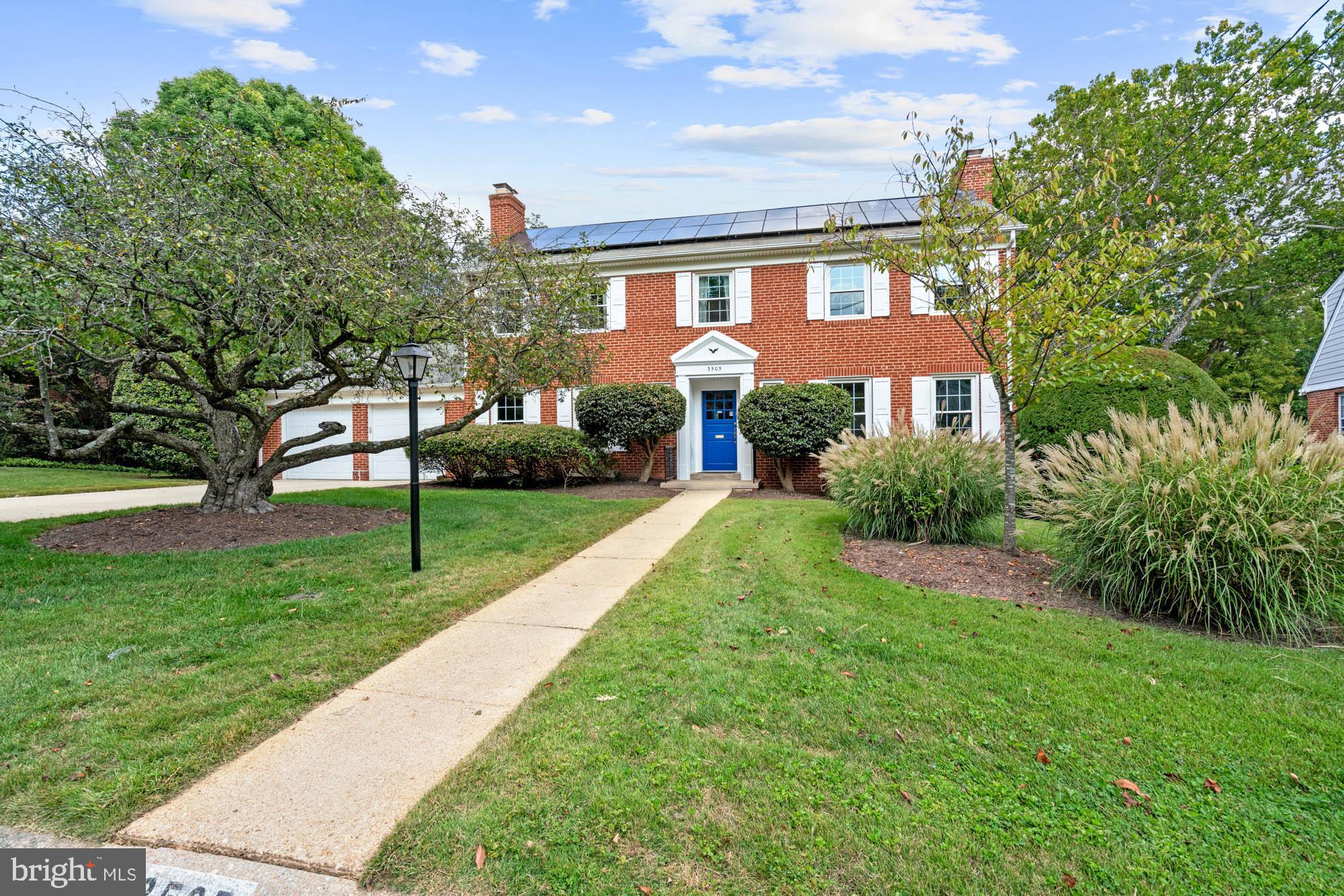 OPEN HOUSE CANCELLED. UNDER CONTRACT. Handsome. Gracious. A classic. Welcome to this net-zero, meticulously maintained Chevy Chase colonial home. Nestled on one of the most serene, tree-lined cul-de-sacs in Chevy Chase Section 5, 3505 Windsor Place blends a timeless floor plan with modern convenience, offering sustainability and comfort in equal measure.
Curb appeal abounds with mature trees, flowering shrubs, and a cheery painted front door that invites guests at first glance. Inside, the formal entry foyer opens to a bright living room with a fireplace that extends into a sunroom featuring a warm wood-paneled ceiling. The formal dining room and spacious, light-filled kitchen accommodate dinner parties of any size. Rich wood textures and natural materials create a cozy and inviting atmosphere in the kitchen. Bathed in natural light, it is a perfect space for both people… and indoor plants. The renovated kitchen flows into a large family room, which boasts another fireplace and warm, paneled built-ins. With a main floor powder room and access to an oversized two-car garage, the layout supports easy daily living and seamless entertaining.
Upstairs, four large bedrooms with wood flooring and generous closets await. The primary suite benefits from multiple exposures, flooding the room with natural light, and features two closets and an updated, whimsical bath. The other three bedrooms share a hall bath, while a dedicated staircase leads to the expansive, floored attic offering potential for an additional bedroom, future bath, or office space — or simply extra storage.
The lower level impresses with a recreation room and a three-season room that leads to the slate patio and gardens. Surprisingly spacious and light-filled, the lower level’s oversized windows illuminate the open gym area, which could easily be converted into another bedroom. Laundry, storage, utility space, and a half bath round out this level.
Outside, the manicured yard provides the perfect setting for both two- and four-legged friends! The garage comes equipped with a dedicated circuit for EV charger, more attic storage, and plenty of space for bikes, lawn equipment, and hobby materials. 3505 Windsor Place enjoys extreme energy efficiency with solar system panel installation, tankless hot water heater, and all new replacement windows throughout the home (2020). Updated kitchen and baths, and a well-documented maintenance history ensures peace of mind.
Life on Windsor Place offers more than just a beautiful home — it’s about community and convenience. Take a leisurely stroll to nearby shops on Brookville Road for ice cream at Olympia Cafe or a celebratory cocktail at La Ferme. Enjoy waving to neighbors as you bike to downtown Bethesda or explore the shops along the Connecticut Avenue corridor. Located inbounds for the sought-after Bethesda-Chevy Chase school cluster, this home presents an exceptional opportunity for comfortable living in a prime location.
