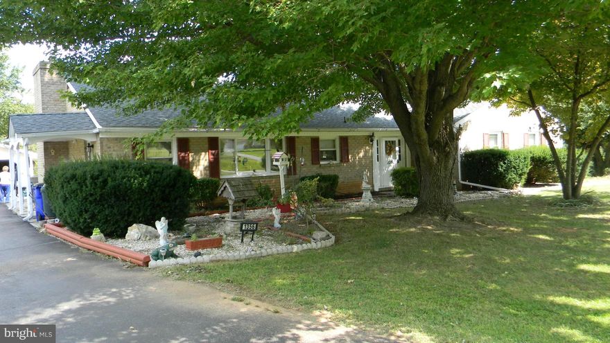 Over 2400 square foot rancher on 3 acres!  Four bedrooms, laundry and 2 1/2 baths on the main level.  Very large living room, kitchen and family room.  Family room has sliders to back yard and pellet stove insert in the wood burning, brick faced, fireplace. Huge, partially finished basement with a full bath. Detached 2+ car garage, new roof in 2012 and new concrete patio in 2013.