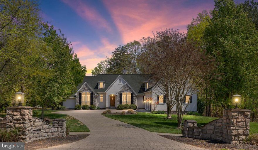 Distinctive French Country Estate in the Prestigious Fawn Lake Community!

Welcome to a truly one-of-a-kind French Country-style residence nestled on a beautifully landscaped 1.04-acre lot in the highly sought-after, gated community of Fawn Lake. Boasting 3,652 sq ft of thoughtfully designed living space, this elegant 4-bedroom, 2-full bath and 2-half bath home blends timeless architecture with modern comforts and high-end upgrades throughout.

Step through the custom front entry door—with its charming speakeasy window—and into a home filled with character. Soaring cathedral and vaulted ceilings, architectural columns, and custom grid-less windows invite natural light into every corner, creating a warm and inviting atmosphere.

The main-level primary suite offers a serene retreat, complete with a recently remodeled spa-inspired bathroom featuring a luxurious soaking tub, walk-in shower, and a spacious walk-in closet.

At the heart of the home lies a gourmet kitchen designed for both style and function. Outfitted with quartz countertops, a designer tile backsplash, stainless steel appliances, and an open-concept layout, this kitchen is perfect for casual meals and entertaining alike.

Additional features and highlights include:
- Freshly refurbished and painted main shutters for enhanced curb appeal
- Professionally landscaped grounds
- Expansive vinyl deck overlooking the backyard, ideal for outdoor living
- Spacious laundry room with sink and laundry chute
- Bonus 4th bedroom or recreation room above the garage
- Oversized 3-car garage (828 sq ft) with a temperature-controlled bay
- Walk-in attic offering generous storage space
- Double-sided see-through fireplace
- Large walk-in pantry with space for a coffee bar and extra mini fridge
- Main HVAC replaced in 2021, with the upstairs system upgraded in 2015 for year-round energy-efficient comfort.

Community Perks:
Enjoy resort-style living with access to Fawn Lake’s unparalleled amenities: a 288-acre recreational lake, private beach, golf course, clubhouse, marina, dining, tennis courts, sports fields, dog park, fitness center, scenic walking trails, playgrounds, and more.

✨ This is a rare opportunity to own a unique estate in one of the region’s most desirable communities. Schedule your private showing today and experience the lifestyle that awaits in Fawn Lake!