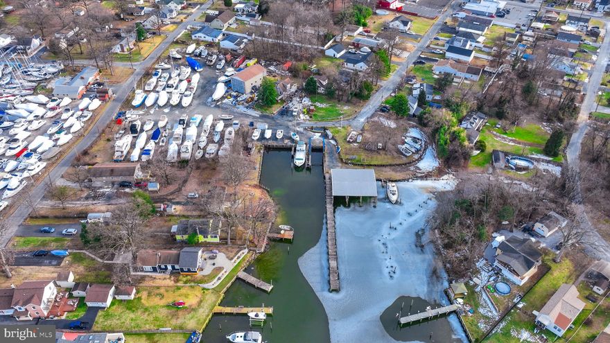 Endless possibilities await! This is your chance to own a unique Multi-Use 3+ Acres, 380 ft , Waterfront opportunity! Discover major subdivision potential , perfect for new construction development, townhomes or condominiums! Dream bigger with the option to create a sought after marina or even a one of a kind wedding venue! The opportunities are endless, and your vision starts here! This property currently has 1 residential home on premise that would make for great rental income while you build your dream development. 

Sale includes 6 Parcels- Tax ID 151512000267 Zoned DR 3.5, Tax ID 151502571040 Zoned DR 3.5, Tax ID 151504202891 Zoned DR 3.5, Tax ID 151504202892 Zoned DR 3.5, Tax ID 151504200731 Zoned BMB, Tax ID 151504200730 Zoned BMB

Property being sold As-Is. Sellers make no representations. Purchaser to verify Real Estate Taxes. Current business and equipment is not included in the sale. Tax assessed value in this listing is estimated.