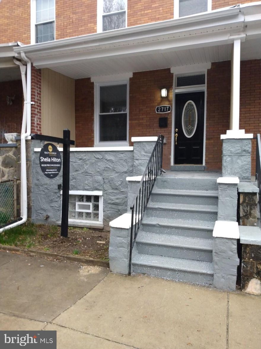 This property is eligible for 100% financing, closing cost assistance, no mortgage insurance and funded needed can come from a gift or grant. Why rent when you can own for less than $1500. This fully renovated home is ready for your final touches.  It features an open floor plan with marble ceramic tile throughout the first floor. The kitchen has granite countertops along with stainless steel appliances, new wall to wall carpet in the bedrooms and a large stand alone tub. A SHOWER HAS BEEN ADDED TO THE SECOND FLOOR BATHROOM.  The basement has a family room, laundry room, storage closet and a second bath with a shower. Come home to your own private and secured parking pad.  All new AC and heating system with an upgrade to the electrical and plumbing. Available are Baltimore City grants which includes the First Time Homebuyers' incentive, Live Near Your Work, Buying into Baltimore, Forgivable FHLB Grant and others.