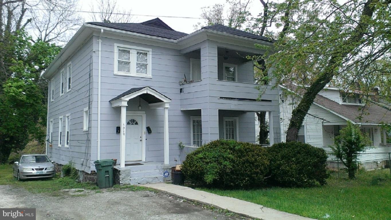 UTILITIES INCLUDED Lovely first floor apartment in a large home. Locked entry, driveway and private balcony.The kitchen features new cabinets, counter-tops and appliances. Exit from kitchen to huge back yard. Full pantry and plenty of windows.Large driveway.