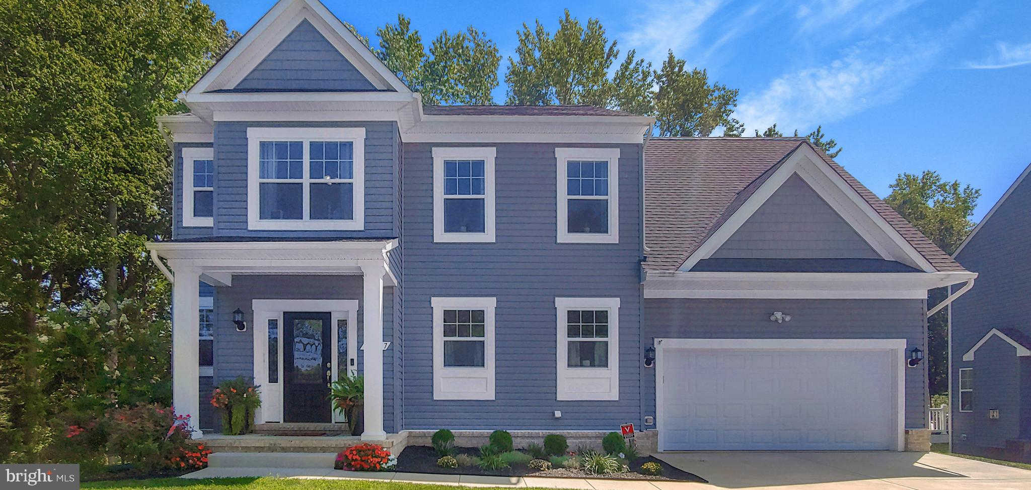 Gorgeous 4 Bedroom Home at the end of a Private Lane in the now Sold Out Community of Elizabeth Hills. The Covered Front Porch Welcomes Guests into an Open Concept Floorplan with Hardwood Floors. Large Bright Kitchen with Stainless Appliances, Granite Countertops, Pantry and a Breakfast Bar with Plenty of Seating and Storage. Cozy Living Room with Gas Fireplace overlooks a Dining Area with a Glass Slider that leads out to a Composite Deck. Lovely Owners Suite with Walk-In Closet and an Ensuite Bathroom with a Tiled Shower, Soaker Tub and Double Vanities. Finished Basement with a Large Family Room, Exercise Area and an additional Full Bathroom. This Picture-Perfect Home was built in 2018 on a Premiere Lot that Backs to the Woods. The exterior of this property is just as impressive as the inside with a Custom Patio, Lovely Landscaping, Amish Built 12x10 Shed, 2 Car Garage, Concrete Driveway and Sidewalk. The owners goal was to create a socially inviting space that was warm, charming and low maintenance....and they achieved it.