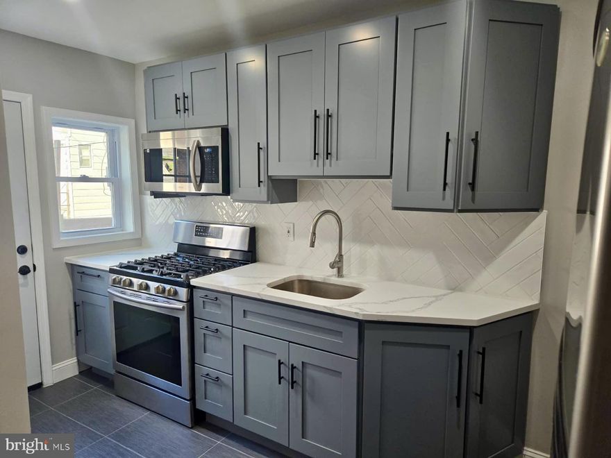 Recently refreshed, beautiful home.  3-bedroom, 2-bath house with an open layout and finished basement. Washer and dryer hookup included. Offers both street and alley parking with convenient access to shopping, dining, and public transportation. Ready to move in.