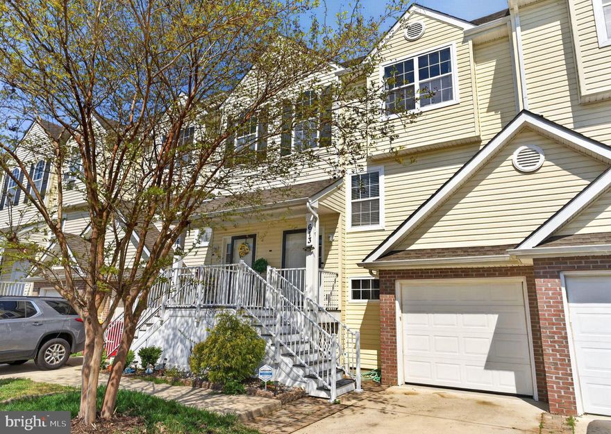 Just Listed in Seaford's Belle Ayre community! 3-4BR/2.5BA Townhome - Flexible floorplan with great outdoor space. Main floor features a wide open great room with balcony access, dining area, living area, pass-through to the kitchen, breakfast bar. Nice-sized kitchen with updated stainless steel appliances, breakfast nook, pantry. Half bath completes the main floor. Upstairs, the primary bedroom offers a vaulted ceiling, ceiling fan, full, en-suite bath with tub/shower combo. 2 additional bedrooms and a 2nd full bath.  Lower floor houses the oversized 1-car garage with built-in storage, laundry room with stackable washer/dryer, additional storage, and a flex room / guest bedroom with sliders to the oversized rear deck / patio, fenced on both sides, with plenty of room to BBQ, hang out, put up a hammock or two, and enjoy these beautiful spring days. Minutes to boutique shopping, incredible local dining, and events in Historic Downtown Seaford, as well as big box stores and national chains along Route 13. Great, central location - 30-35mi to the Delaware Beaches, Easton, or Dover - 25mi to Cambridge or Salisbury - 12mi to Hurlock - about an hour to the Bay Bridge. Come enjoy the Sussex County life - low property tax, NO sales tax, and a pace as exciting or relaxing as you like! Sizes, taxes, distances are approximate.
