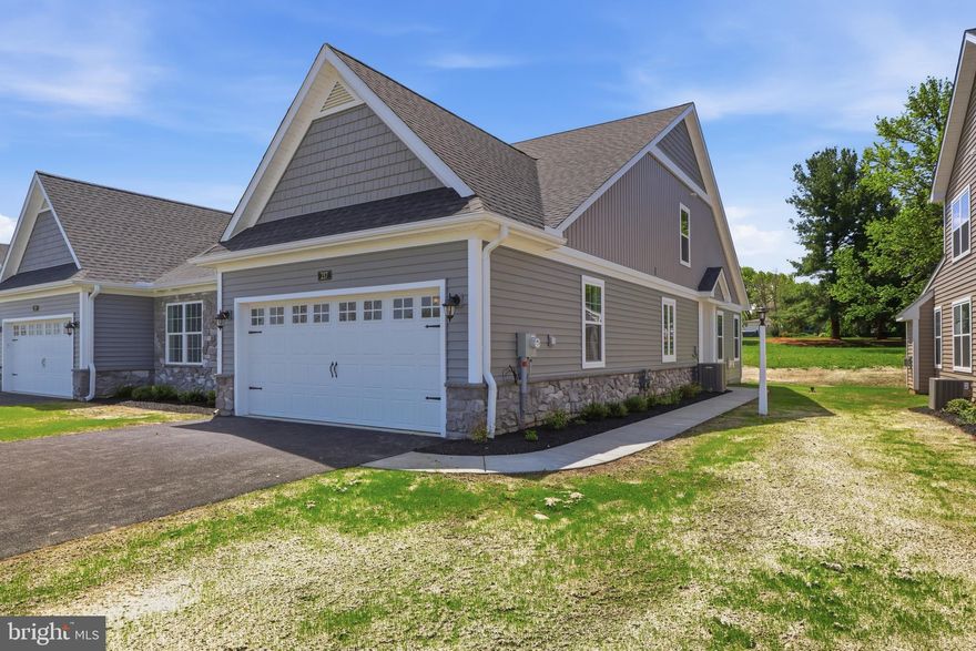Welcome to effortless living in the sought-after Bellaride section of the Crossgates community in Millersville. This home is complete and ready for Occupancy. Thoughtfully designed this beautifully crafted semi-detached home offers the comfort of main-floor living without sacrificing space, style, or functionality. Say goodbye to the hassle of stairs, unused rooms, and overwhelming maintenance, and enjoy a home designed to simplify everyday living while still allowing room for guests, hobbies, and storage.

The heart of the home is the intelligently designed circular-flow floor plan, creating smooth and easy access between the kitchen, dining area, great room, primary suite, laundry room, and back to the kitchen—perfect for comfortable daily routines and effortless entertaining. The spacious first-floor primary suite provides a peaceful retreat with a luxurious ceramic tile shower and tile flooring, while a secondary bedroom and full bathroom on the main level offer flexibility for guests, a home office, or multi-generational living. An unfinished second-floor area provides valuable storage space or the opportunity to finish it into a third bedroom, hobby room, or private retreat for visiting family.

Quality finishes and low-maintenance features are found throughout, including gas heat and cooking, stainless steel appliances, quartz countertops, ceramic tile backsplash, luxury vinyl plank flooring, and a cozy gas fireplace in the great room. Step outside to enjoy the outdoor patio with foundation, offering the perfect setting for relaxing mornings or quiet evenings without the burden of extensive exterior upkeep.

The HOA takes care of snow removal and lawn mowing, allowing you more time to enjoy life and less time worrying about home maintenance. Residents of Crossgates enjoy walking paths, tennis courts, ball fields, and close proximity to golf, dining, shopping, and all that Lancaster County has to offer.