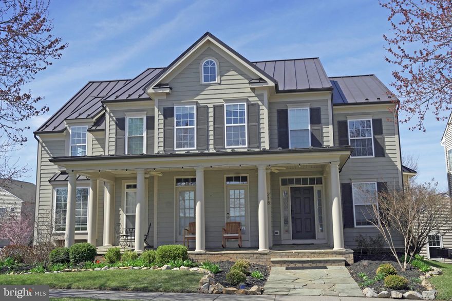 Welcome to this stunning Colonial home in the highly sought-after Huntfield community in Charles Town, offering nearly 5,000 finished square feet of beautifully designed living space with an open floor plan, abundant natural light, and elegant hardwood flooring throughout the main level. This 4 bedroom, 3.5 bath home features a gourmet kitchen with stainless steel appliances, a six burner gas range, butler’s pantry, wet bar with mini fridge, and a spacious breakfast area ideal for entertaining and everyday living. The main level also includes a formal dining room, living room, private office or library, and a welcoming family room with a gas fireplace. The upper level showcases a luxurious owner’s suite with a sitting room, oversized walk in closet, and spa inspired bath with dual vanities, soaking tub, and separate shower, along with three additional generously sized bedrooms, all with walk in closets, and a convenient laundry room. The finished lower level offers a large recreation room, full bath, and flexible space for a home gym, media room, or guest area. Outdoor living is just as impressive with a charming front porch, expansive rear deck, and a fully fenced backyard designed for privacy and relaxation. Additional features include a two car attached garage. Ideally located for commuters to Northern Virginia, Maryland, and Washington, D.C., and just minutes from historic downtown, shopping, dining, and entertainment, this home offers comfort, space, and convenience in one exceptional package.