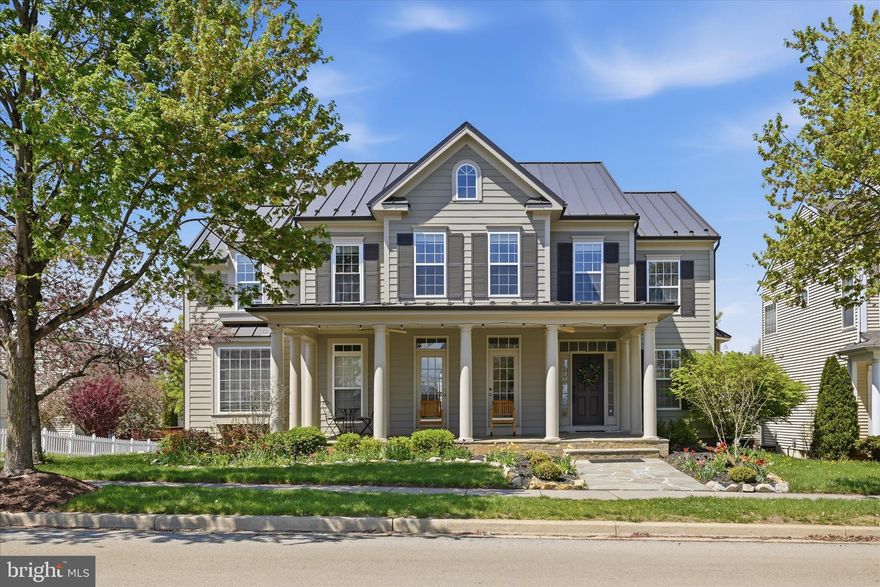 Welcome to 218 Braddock Street in the highly sought-after Huntfield community in Charles Town, West Virginia, offering the perfect blend of space, lifestyle, and commuter convenience in Jefferson County WV. This beautifully maintained 4 bedroom, 3.5 bath Colonial home features an open and functional floor plan with hardwood flooring, abundant natural light, and multiple living areas designed for today’s buyers. The gourmet kitchen is ideal for everyday living and entertaining, complete with stainless steel appliances, a six burner gas range, butler’s pantry, wet bar, and spacious breakfast area, all opening to a comfortable family room with gas fireplace. The upper level offers a luxurious primary suite with a private sitting room, oversized walk-in closet, and spa-inspired bath, along with three additional generously sized bedrooms and convenient upper-level laundry. The finished lower level provides flexible space for a recreation room, home gym, media room, or guest suite. Outdoor living includes a welcoming front porch, expansive rear deck, and fully fenced backyard. This home is uniquely positioned directly in front of the community courtyard, creating a front-row seat to neighborhood events such as holiday celebrations, pictures with Santa, pony rides, movie nights, and community gatherings. Huntfield residents enjoy exceptional amenities including tennis courts, basketball courts, two playgrounds, and a soon to open pool and clubhouse.  Ideally located for commuters to Northern Virginia, Maryland, and Washington DC, and just minutes to historic downtown Charles Town, shopping, dining, and entertainment.