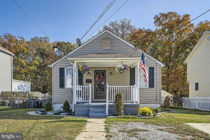 ******Multiple offers received. Offer deadline is Saturday January 27th at 4pm**********Adorable 3BR/2BA expanded cottage located on a spacious lot in the quiet neighborhood of Essex.  Pull into the double wide driveway, make your way to the cozy covered front porch,  and open the door into your forever home. Step inside to an open floor plan with an eclectic design beginning in the spacious living room and leading into the large kitchen.  The kitchen offers plenty of counter space with gray lower cabinets and white uppers finished with crown moldings, a beautiful tiled backsplash, and stainless steel appliances.  Beyond the kitchen is one of two primary sized bedrooms and a full bath.  Down the hall are the two remaining bedrooms, a sizable secondary, a spacious primary, and a full bath.  The lower has tons of possibilities with one finished room ideal for office space, laundry, storage, and a walk-out to the fenced side yard.  Step out onto a wood deck that overlooks tons of green space in the sprawling yard ideal when hosting family gatherings.  This home is perfect for the new homeowner and is located in close proximity to shopping, restaurants, and commuter routes.