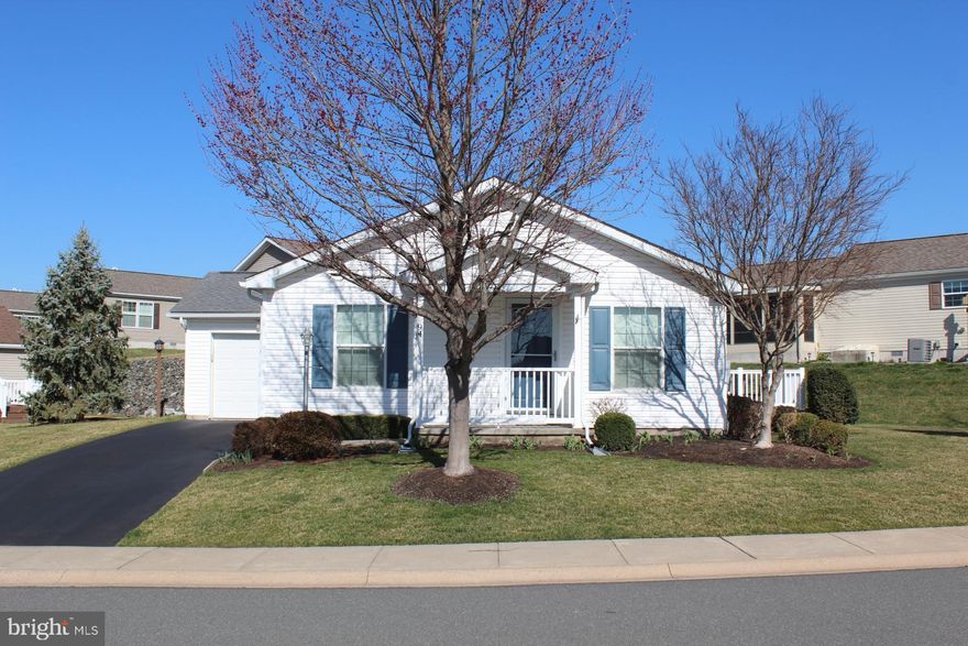 Welcome to Douglass Village, this Active 55 & older community is nestled in Berks County.   Enjoy a carefree lifestyle in this meticulously maintained home.  Features include spacious Living & Dining room combination basked in natural light w/access to maintenance free deck overlooking yard.  Eat-in kitchen w/natural wood cabinetry and laundry area. Nicely sized master bedroom suite w/private bath and tub style shower. The second bedroom is perfect for guests, home office, craft room or multiple other uses and has access to additional full bath. Enjoy the attached one car w/inside access & storage.  Lovingly maintained yard. Douglass Village Community center includes a clubhouse w/ fitness center, heated pool and library. Carefree living w/common area maintenance & trash included. GORUND RENT IS 699.00 .