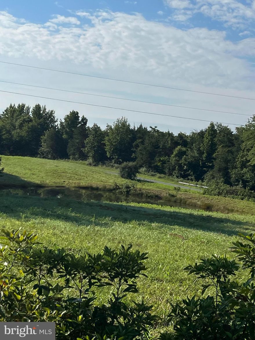 Make Offer! Approx 2 ac lot mostly open with pond and lovely building site.  Corner of Holland Creek Road and Hasher.  Convenient to Charlottesville, Richmond,  Short Pump,; fiber optic available I 64. Purchaser will have to subdivided this lot off of a parent parcel of 12 acres accross I64.  Lot has not been perked or survey which will also be the responsibility of purchaser.