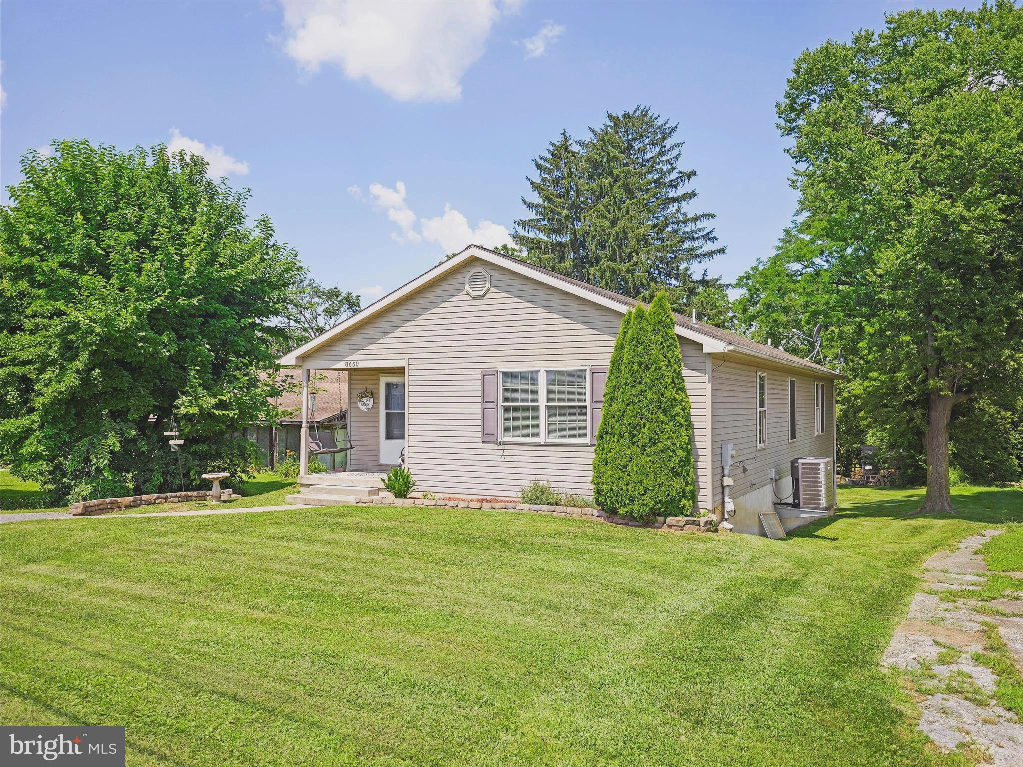 Tucked away in the heart of historic Williamsport, this charming ranch-style home offers the perfect blend of comfort, space, and location. With nearly 1,500 square feet of living space all on one level, this 3-bedroom, 2-bath home includes a private en suite and thoughtful finishes like Corian countertops and easy-care laminate flooring throughout, adding style and practicality to your everyday living.
Set on a generous half-acre lot that backs to open farmland, the property feels like your own private retreat. A chicken coop out back makes it easy to enjoy fresh eggs or explore hobby farming, creating a sense of calm and connection to nature.
Inside, the expansive basement provides a huge amount of flexible space—perfect for creating a cozy family room, game area, workshop, or additional bedrooms. Recent updates bring peace of mind, including a newer 50-gallon hot water heater installed in 2022 and a UV light on the well for clean, worry-free water.
When it’s time to unwind or explore, you’ll love being just minutes from hiking and biking along the C&O Canal, fishing and boating on the Potomac River, or spending sunny afternoons at nearby parks with public pools, ball fields, and picnic pavilions. The home’s sought-after location also means quick access to highways, shops, and schools—combining small-town charm with everyday convenience.
This is a place where you can spread out, settle in, and savor a simpler way of living. Come see all the possibilities waiting here for you in this move in ready property.