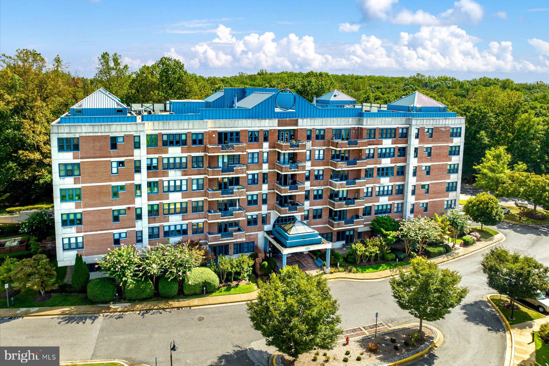 Renovated 2 bed, 2 bath condo with a storage unit, offering modern updates and treetop views. The kitchen features newer appliances, sleek cabinetry, and updated countertops. Fresh paint and upgraded flooring enhance the space. Enjoy a private balcony, new HVAC, hot water heater, washer and dryer, and kitchen appliances. Building amenities include indoor and outdoor pools, a game area, an elevator, and a stylish lobby. A prime location with modern upgrades. Heritage Harbour offers proximity to shopping, restaurants, health care and water access for boating. Community lodge provides additional indoor/outdoor pools, fitness center, library, and more.
