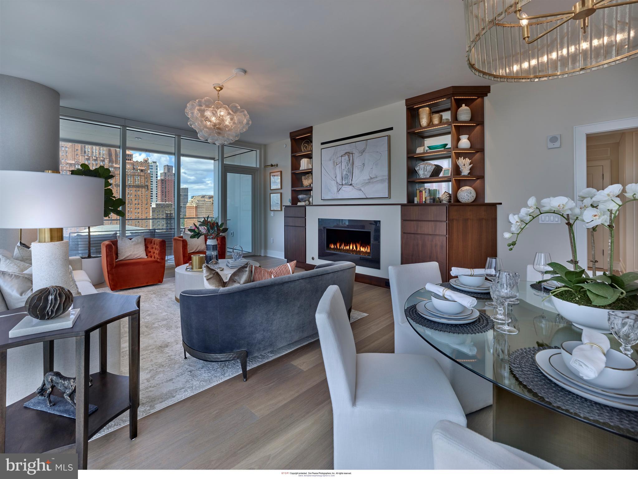 Arthaus, a commanding new residential high-rise in Philadelphia’s performing arts district, presents Unit 804: A stunning 2-bed, 2-bath, 1,730 SF single-level residence with Kimmel Center views priced at $1,470,500.
This maintenance-free, move-in ready, home offers high-end interior design, resort amenities and white gloves services. Tax abatement is available. Whether you’re a busy professional, retiree or globe trotter, 804 is a MUST SEE!
Arthaus impresses from the moment you enter. The tall solid wood door with elegant hardware sets the stage, leading to a spacious, light-filled foyer with the large coat closet and convenient hallway bath and laundry room facilities. The great room offers views of the city featuring a blended kitchen, living and dining space with soaring ceilings, floor to ceiling windows, wide-plank Havwood flooring and a weather-protected walk out balcony. Drenched in natural light this space is bright, airy, and feels twice its size on paper.
The chef’s kitchen is everything you need for hosting, with a large center island that seats four. The two tone kitchen cabinetry by Poggenpohl are polar white/Tennesse Nussbaum and the countertops Super white quartz with matching backsplash. The high-end, stainless appliance package includes: Wolf, Bosch, Sub-Zero and Asko appliances and door fronts have been fully integrated into the cabinet design for a seamless look.
The primary suite and guest bedroom are on the west side of the condominium.
The guest bedroom is a quiet retreat for visiting guests with gorgeous Kimmel Center views and walk-in closet. The full bath in the hallway is finished with porcelain Calacatta tile floors, super white quartz countertops, and polar white matte Poggenpohl cabinets. The spacious Owner’s suite is wrapped in 10' floor-to-ceiling windows and features two step-in closets. A Badeloft soak-in tub, double vanity with Robern mirrors and super white quartz marble, Contempo white marble floors and shower tile, and a Kohler toilet closet complete the best-in-class bathroom package.
Arthaus is a modern masterpiece crafted by renowned developer Carl Dranoff, designed by Kohn Pedersen Fox and built by Intech Construction. Its architecture and amenities prioritize wellness and well-being, from the stunning Monet-inspired mosaic in the lobby to the private resort on the 6th and 7th floors, featuring a pool, fitness facilities, spa, salon, pet park, outdoor terraces, lawns, gardens and more. White glove services include 24-doorman, concierge, chauffeured town car and car valet.
This home comes with 1 parking license. With the 10-year tax abatement annual real estate taxes are approximately $2,772.