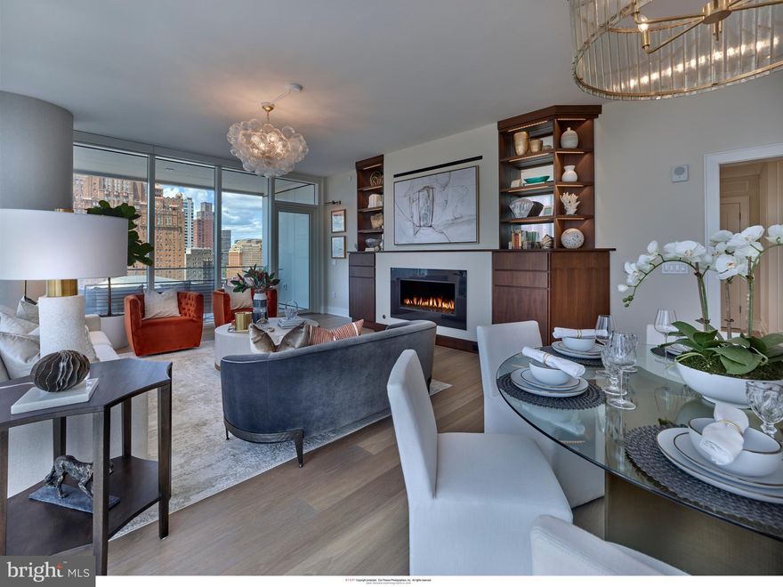 Arthaus, a commanding new residential high-rise in Philadelphia’s performing arts district, presents Unit 804:  A stunning 2-bed, 2-bath, 1,730 SF single-level residence with Kimmel Center views priced at $1,470,500.  

This maintenance-free, move-in ready, home offers high-end interior design, resort amenities and white gloves services.  Tax abatement is available.  Whether you’re a busy professional, retiree or globe trotter, 804 is a MUST SEE!

Arthaus impresses from the moment you enter.  The tall solid wood door with elegant hardware sets the stage, leading to a spacious, light-filled foyer with the large coat closet and convenient hallway bath and laundry room facilities.  The great room offers views of the city featuring a blended kitchen, living and dining space with soaring ceilings, floor to ceiling windows, wide-plank Havwood flooring and a weather-protected walk out balcony. Drenched in natural light this space is bright, airy, and feels twice its size on paper.

The chef’s kitchen is everything you need for hosting, with a large center island that seats four.  The two tone kitchen cabinetry by Poggenpohl are polar white/Tennesse Nussbaum and the countertops Super white quartz with matching backsplash. The high-end, stainless appliance package includes: Wolf, Bosch, Sub-Zero and Asko appliances and door fronts have been fully integrated into the cabinet design for a seamless look.

The primary suite and guest bedroom are on the west side of the condominium.   
The guest bedroom is a quiet retreat for visiting guests with gorgeous Kimmel Center views and walk-in closet. The full bath in the hallway is finished with porcelain Calacatta tile floors, super white quartz countertops, and polar white matte Poggenpohl cabinets. The spacious Owner’s suite is wrapped in 10' floor-to-ceiling windows and features two step-in closets. A Badeloft soak-in tub, double vanity with Robern mirrors and super white quartz marble, Contempo white marble floors and shower tile, and a Kohler toilet closet complete the best-in-class bathroom package. 

Arthaus is a modern masterpiece crafted by renowned developer Carl Dranoff, designed by Kohn Pedersen Fox and built by Intech Construction.  Its architecture and amenities prioritize wellness and well-being, from the stunning Monet-inspired mosaic in the lobby to the private resort on the 6th and 7th floors, featuring a pool, fitness facilities, spa, salon, pet park, outdoor terraces, lawns, gardens and more.  White glove services include 24-doorman, concierge, chauffeured town car and car valet. 

This home comes with 1 parking license. With the 10-year tax abatement annual real estate taxes are approximately $2,772.