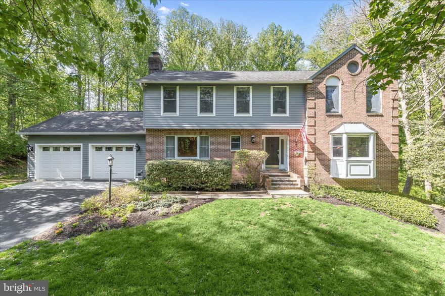 Nestled in the serene Gaither Sideling community, this charming Colonial home offers a perfect blend of comfort and elegance. With 5 spacious bedrooms and 3.5 bathrooms, this residence spans over 3,600 sq. ft., providing ample space for relaxation and entertaining. Step inside to a warm and inviting interior, beginning with the living room enhanced with elegant crown molding, French doors, and a cozy fireplace, offering a refined yet comfortable gathering space. The formal dining room features chair railing and crown molding that create timeless sophistication for special occasions. The gourmet kitchen and breakfast room serve as the heart of the home, designed for both everyday living and entertaining. The kitchen features stainless steel appliances, a statement range hood, an expansive center island, a breakfast bar, quartz countertops, and a pantry. The adjoining breakfast room is truly breathtaking, showcasing a soaring cathedral wood ceiling and lofty Palladian windows that flood the space with natural light and architectural beauty. Just beyond, the family room provides a warm and inviting retreat, highlighted by a striking stone-profile fireplace and additional crown molding, creating the perfect setting for relaxing or gathering with family and friends. Travel upstairs to find the primary suite, which offers a peaceful retreat complete with a walk-in closet and an attached full bath featuring a soaking tub and double vanity. Four additional spacious bedrooms and a well-appointed full bath complete the upper level, providing comfort and flexibility for family or guests. The fully finished lower level expands the living space with a brick-profile accent wall, wet bar, additional bedroom, full bath, gym area, and ample storage, along with easy walkout access to the outdoor oasis. Set on a private 3.1-acre lot, the exterior is truly exceptional, featuring lush, wooded surroundings, extensive hardscaping, and a heated inground pool. Multiple outdoor living areas, including decks and patios, create the perfect setting for relaxation and entertaining. An attached garage and generous parking complete this remarkable property. Experience the perfect blend of refined indoor living and resort-style outdoor amenities in this thoughtfully designed home, where every detail has been curated for comfort, elegance, and enjoyment. Recent updates include pool plaster, coping, and tile, two HVAC units, gourmet kitchen, paint throughout, water PH neutralizer,        water treatment system, UV light, powder room, wet bar, lower-level carpet, driveway resealed, and more!