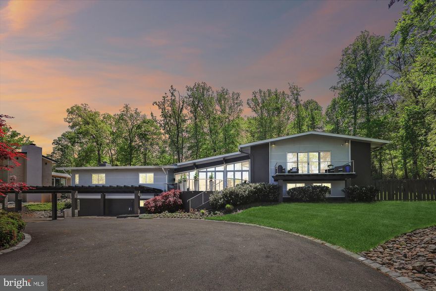 Welcome to 1465 N Pegram St, Alexandria, VA – an extraordinary home that breaks free from the ordinary and caters to the desires of car enthusiasts and those seeking a unique, luxurious lifestyle. This stunning contemporary residence offers unparalleled features tailored for discerning buyers who crave a departure from the ubiquitous modern farmhouse or colonial styles.

A Car Lover’s Dream Come True:

Expansive Four-Car Garage: This massive garage is a haven for car aficionados, providing ample space not only to house your prized car collection but also to create your own personal workshop. With high ceilings and a well-ventilated layout, it’s perfect for car maintenance, detailing, and even hosting car-themed gatherings.

Multipurpose Use: Beyond vehicle storage, the garage can be transformed into a hobbyist’s paradise. Consider setting up a home gym, a DIY workspace, or even a showroom for your vintage cars and motorcycles. The possibilities are endless for creating a space that matches your passion.
Additional Parking: The extensive driveway can accommodate 15+ cars, making it ideal for hosting car clubs, social events, or simply providing ample parking for guests during large gatherings.
A Unique Living Experience:

Architectural Masterpiece: This home stands out with its contemporary design, featuring floor-to-ceiling windows, NanaWall folding glass doors, and an open floor plan that seamlessly integrates indoor and outdoor living. Forget cookie-cutter designs; this home is an architectural gem recognized with the Award for Excellence in Architecture by the City of Alexandria Beautification Commission.
Luxurious and Modern Amenities: Enjoy a state-of-the-art chef’s kitchen equipped with GE Monogram stainless steel appliances, including a commercial-grade gas range, double oven, and wine cooler. The enormous island with a waterfall stone finish is perfect for culinary adventures and entertaining.
Smart Home Integration: Experience the ultimate in convenience and luxury with an integrated Sonos sound system, automated lighting controls by Lutron, and smart pool and irrigation systems, all easily managed from your smartphone.

Entertainment and Relaxation:

Backyard Oasis: Dive into luxury with a heated pool and hot tub, complemented by a natural gas-connected grill area and spacious patio for hosting unforgettable outdoor parties. The beautifully landscaped backyard offers ample green space for relaxation and recreation.

Spacious and Elegant Interiors: The main level features floor-to-ceiling windows and NanaWall folding glass doors, merging indoor and outdoor living seamlessly. The great room, dining area, and main level study with a granite-surround fireplace provide ample space for entertaining and relaxation.
Prime Location and Convenience:

Excellent Accessibility: Just a minute from I-395, express lanes, and close to shopping and INOVA hospital, this home offers the perfect balance of seclusion and convenience.

Desirable Neighborhood: Situated on nearly an acre of land, the property provides a sense of space and privacy while being part of a vibrant and welcoming community.

For car lovers and those seeking a luxurious and uniquely designed home, 1465 N Pegram St is an unparalleled opportunity. Don’t miss your chance to own this extraordinary property that perfectly blends passion, comfort, and distinctive style."