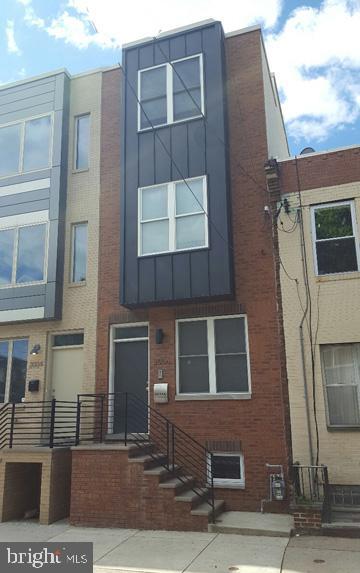 Terrific opportunity to rent this deluxe 3-Bedroom, 2.5-Bath townhouse. This centrally located home features a spacious living room, dining room, state-of-the-art kitchen with stainless steel appliances & wall-to-wall cabinets, finished basement with private den, central air, security system, intercom system, energy-efficient laundry-room (washer & dryer), recessed lighting and hardwood floors throughout. A beautiful home that also offers a private backyard for that seasonal BBQ & spacious roof deck with attached wet bar with panoramic views of the city. Conveniently located in the heart of Point Breeze and just footsteps away from shopping, dining, parks & public transportation, (SEPTA).