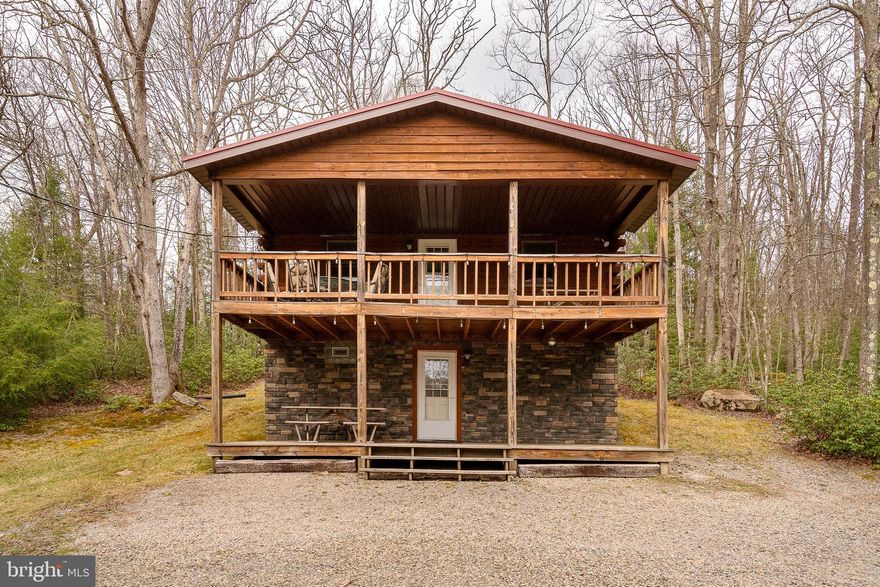 Tucked away in the scenic beauty of Yough Mountain Resort, this exceptional 2-bedroom, 2-bath log cabin offers the perfect blend of rustic charm and modern comfort. Spanning two stories, this immaculately maintained home has seen thoughtful renovations in recent years, creating a warm and inviting retreat that’s move-in ready.

Step inside to discover cozy living spaces ideal for relaxing after a day in nature, with classic log cabin character throughout. Whether you're looking for a peaceful weekend escape or a year-round getaway, this home delivers comfort, privacy, and timeless appeal.

Surrounded by the natural beauty of Garrett County, Yough Mountain Resort is known for its expansive scenic views and outdoor lifestyle. Enjoy direct access to miles of trails perfect for hiking, biking, and ATV adventures—right from your doorstep.

If you’ve been dreaming of a private mountain retreat where you can unwind, explore, and recharge, this beautifully updated cabin is your opportunity to own a piece of Western Maryland paradise.