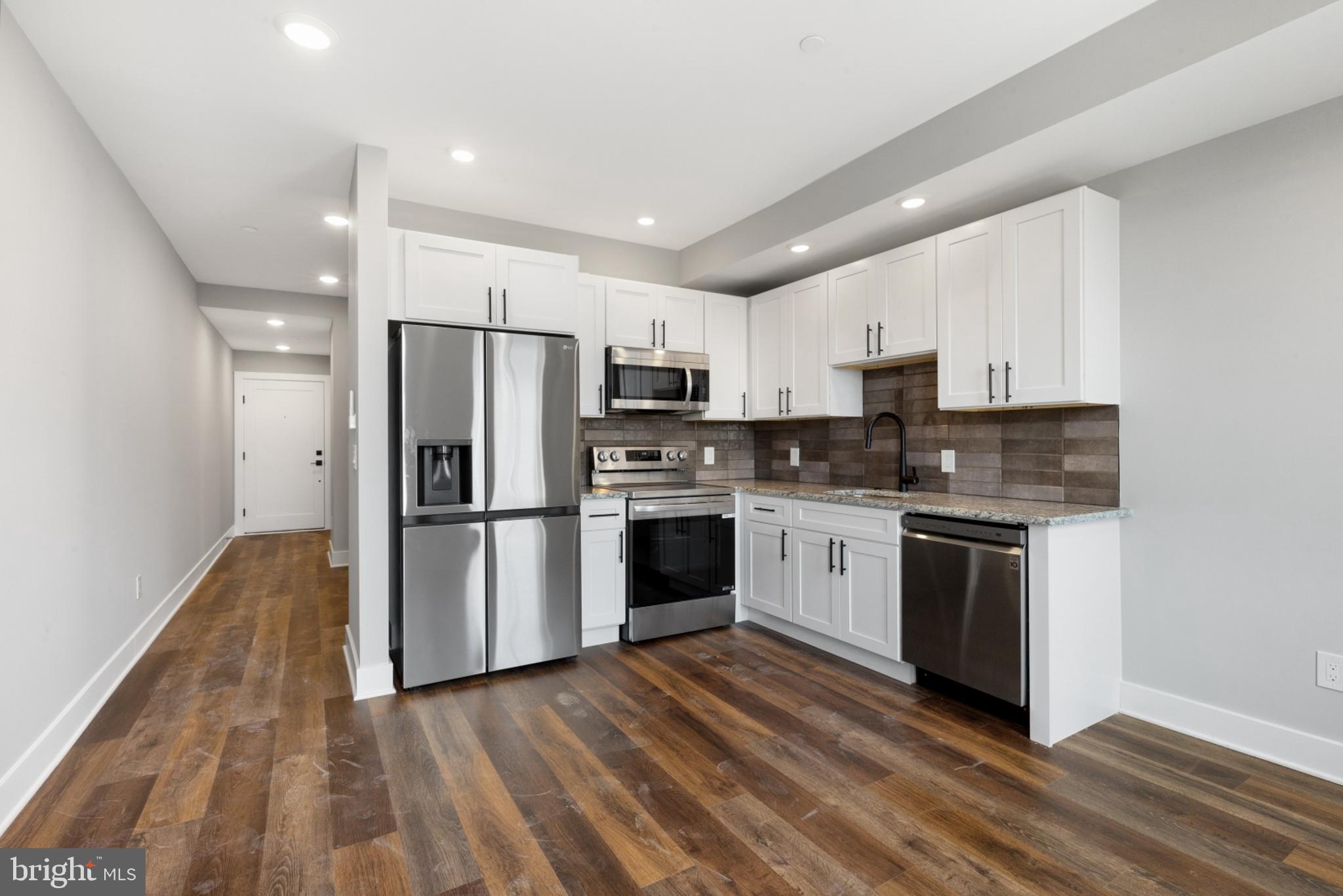 Available NOW | Leasing Special: 1 month FREE on a 13-month lease or 1.5 months FREE on 15-month lease! Gross rent is $1,425/month; net effective rent for a 13-month lease is $1,223/month & net effective rent for a 15-month lease is $1,193/month.
Welcome to Quaker City Flats, a new construction rental community in East Kensington offering 32 modern units designed for those who seek a contemporary, pet-friendly lifestyle. Each unit is a masterpiece, boasting open floor plans, wood floors, and large windows that flood the space with light. The kitchens are equipped with white shaker cabinets, stylish tile backsplashes, and top-of-the-line stainless steel appliances. Luxurious bathrooms feature granite-topped vanities and subway tiled bathtub/shower combos. Convenience is at your fingertips with mini-split A/C systems and in-unit laundry. Unit #404 is a great Junior 1 bed, 1 bath apartment on the fourth floor. Our professionally managed building offers amenities including a main lobby and secure package room to ensure peace of mind. An elevator and two stairwells ensure easy access throughout the building. The shared roof deck offers city views, creating an ideal space for relaxation and entertainment. Limited parking is available, with three dedicated spots at the rear of the building for an additional fee. Experience the thrill of modern luxury and convenience in the heart of urban living. Schedule a tour today to discover your new home at Quaker City Flats! Please note: photos & video tour may be from a similar unit within the building; exact layouts & finishes may vary.
Lease Terms:
Generally, first month, last month, and one month security deposit due at, or prior to, lease signing. Other terms may be required by Landlord. $55 application fee per applicant. Pets are conditional on owner's approval and may require an additional fee, if accepted. (Generally, $500/dog and $250/cat). 2 pet maximum allowance. Tenants responsible for: electricity, cable/internet, and a $35/month (1BD) or $60/month (2BD) flat water fee. Off-street parking is available for an additional $395/month. Landlord Requirements: Applicants to make 3x the monthly rent in verifiable net income, credit history to be considered (i.e. no active collections), no evictions within the past 4 years, and must have a verifiable rental history with on-time rental payments. Exceptions to this criteria may exist under the law and will be considered.