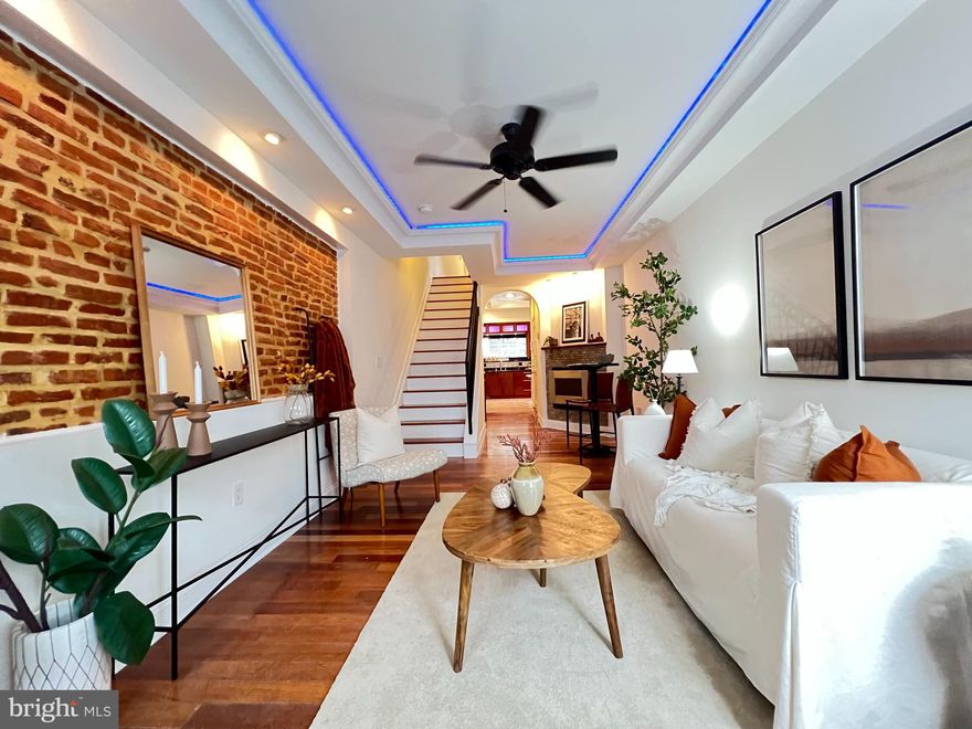 Are you looking for more space? Do you want a large rental property or Air B & B?  Welcome to 3212 O'Donnell Street. Over 2000 sq feet above ground. A beautifully designed 4-bedroom, 3.5-bathroom gem nestled in the heart of Canton, Baltimore. All new paint, brand new Kitchen Aide stainless steel appliances, completely refreshed.  This home seamlessly blends historic charm with modern convenience, offering a luxurious living experience with breathtaking views and unbeatable features.

Step inside to discover gleaming Brazilian Cherry hardwood floors that flow throughout the open-concept main level,  exposed brick, a massive skylight, and an open atrium stretching up four floors, creating a warm and inviting atmosphere. The spacious kitchen is a chef's dream, complete with sleek countertops, ample custom cabinetry, and a unique roll-up garage window that opens to a bar area—perfect for entertaining and enjoying seamless indoor-outdoor living.

Upstairs, find four generously sized bedrooms, including two suites with en-suite bathrooms and ample closet space. The additional bathrooms are beautifully updated, offering both style and function. But that's not all, there's a finished basement that can be a second family room or theater room with a finished bar and half bathroom. 

One of the standout features of this home is the expansive roof deck, where you can take in stunning panoramic views of Baltimore’s iconic Inner Harbor and the historic Fort McHenry. Imagine sipping your morning coffee or hosting evening gatherings with this unbeatable backdrop.

For added convenience, the property includes off-street parking, a rare find in Canton! Enjoy the vibrant neighborhood lifestyle with nearby shops, restaurants, and parks, all while having the peace of mind of easy parking at home. Don't miss the opportunity to own this exquisite Canton property with unparalleled views and modern amenities. Schedule your private tour today and experience all that 3212 O'Donnell Street has to offer!