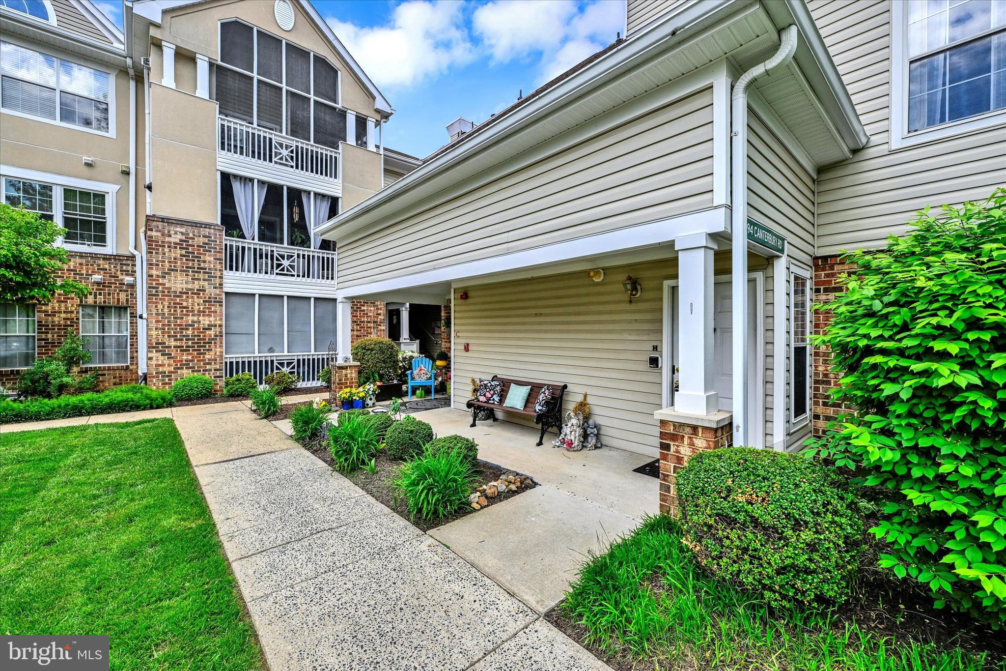 Welcome to the rarely available Devonshire model in the desirable English Country Manor community! This spacious unit stands out with its private outdoor entrance and a layout that offers both comfort and charm. Enjoy views of the beautifully landscaped grounds—including a picturesque view of the community’s distinctive clock tower!
Inside, you'll find a thoughtfully designed layout featuring 2 generously sized bedrooms, 2 full bathrooms, a bright and airy living room, a formal dining area, and a sunroom that invites warmth and comfort. The screened-in porch offers a peaceful retreat—perfect for morning coffee, evening relaxation, or enjoying the changing seasons without leaving the comfort of home.
Recent updates provide peace of mind, including brand-new carpet and fresh paint throughout, a new furnace and A/C system (2024), a newer hot water heater (approximately 5 years old), and a new garbage disposal. The building’s roof has also been recently replaced.
Additional highlights include vaulted ceilings that enhance the sense of space, recessed lighting, and ample storage throughout the unit. Abundant natural light fills the home all day long—one of the owner's favorite features that truly sets this unit apart.