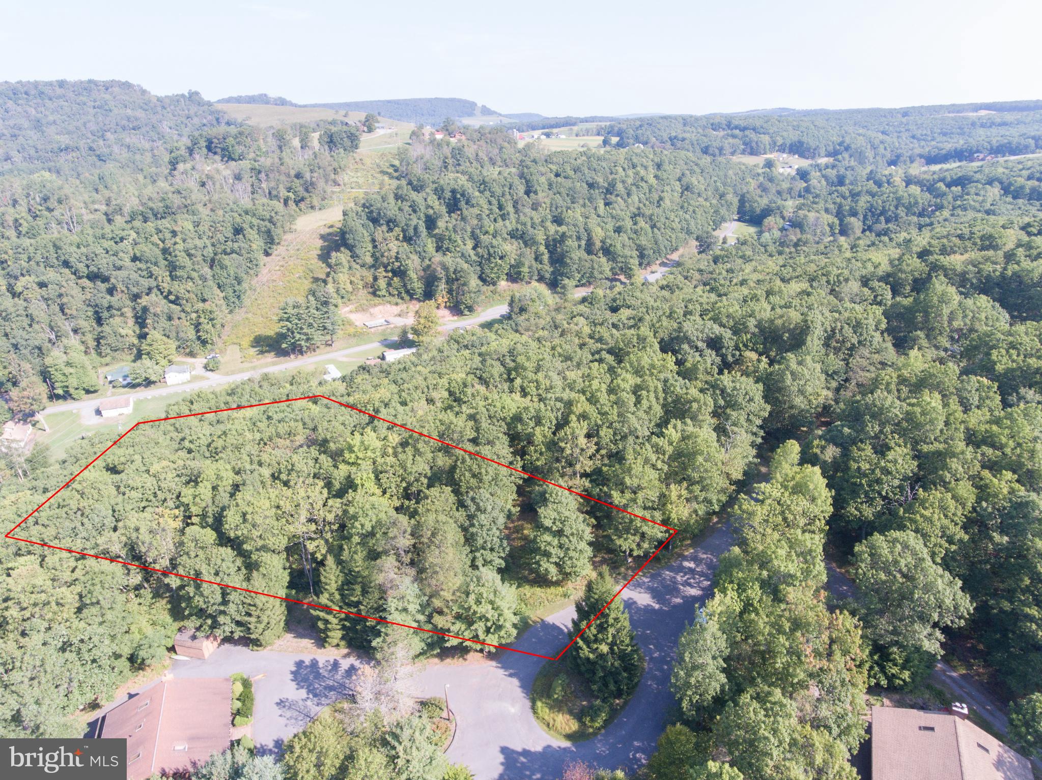Picture perfect location for your log cabin in the woods!! 5 Bedroom approved perc. Build your get-a-way on this wooded lot in the quiet Gleanings community. Less than 5 minutes to Wisp Resort & Deep Creek Lake.