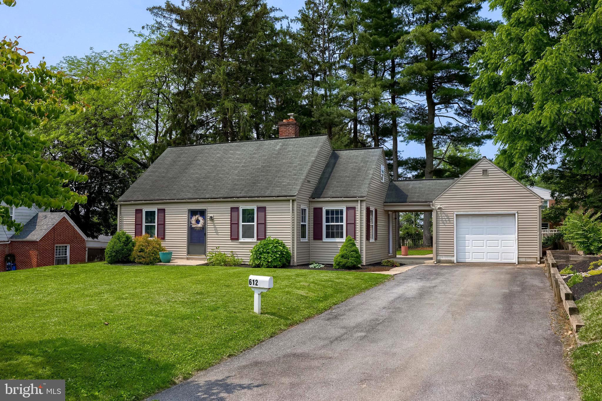Welcome to this charming Cape Cod home in Elizabethtown, featuring 4 bedrooms and 2 full bathrooms, with character and updates throughout. The main level features hardwood floors, two spacious bedrooms, and a full bath, which is perfect for those seeking the convenience of first-floor living. You'll love the cozy dining area with a built-in window seat and a warm, inviting family room complete with a fireplace. Upstairs, you'll find two additional spacious bedrooms. The lower level includes a finished laundry area, a second full bath, and a workshop space that is ideal for hobbies or extra storage. Step outside to enjoy a private backyard with a charming patio, great for entertaining or relaxing. A detached garage with its own work area and additional rear parking (beyond the driveway) adds even more value to this move-in-ready gem. Don’t miss this well-maintained, versatile home with true first-floor living potential. It's ready for you to make it your own!