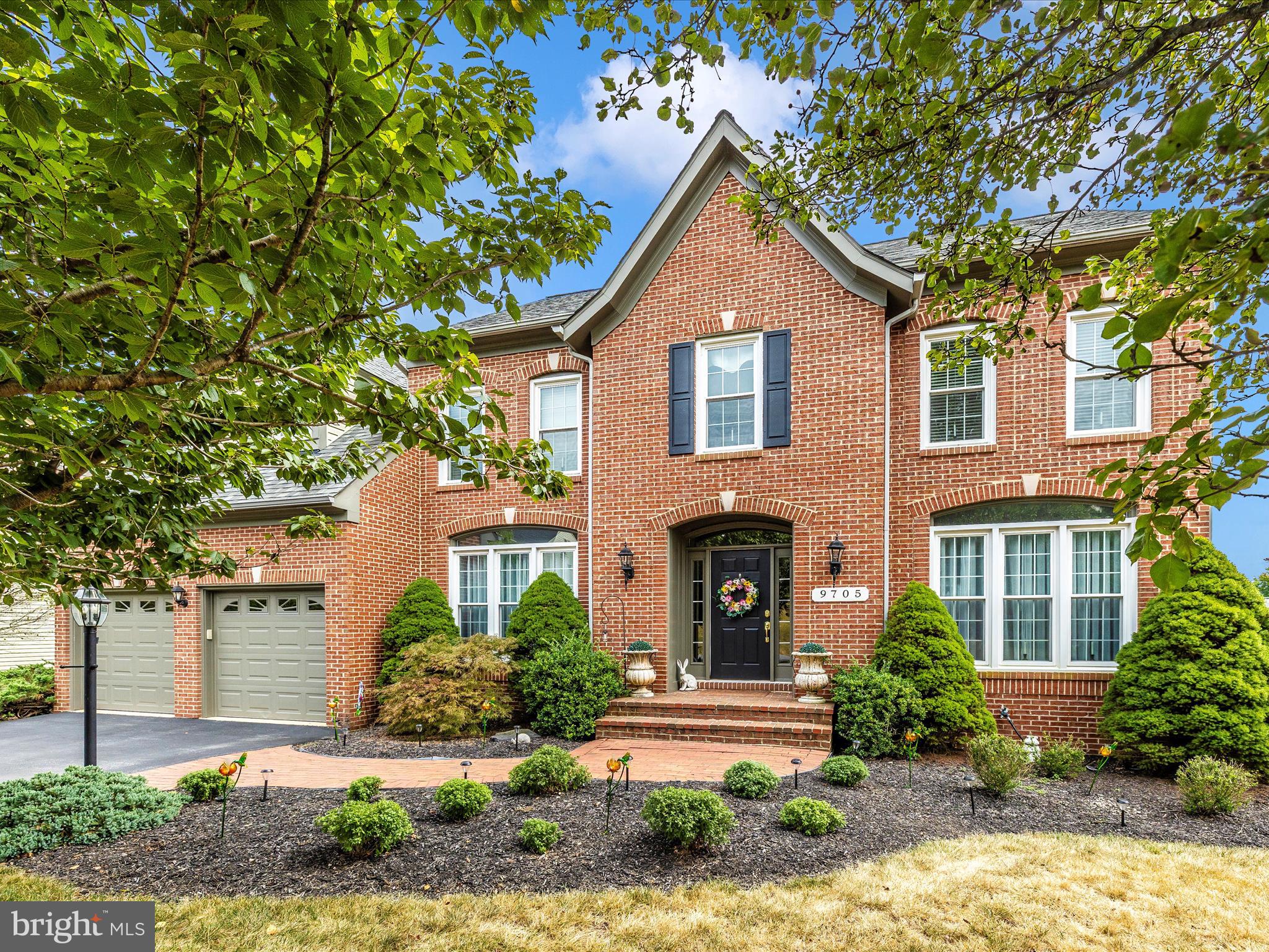 Welcome to this exquisite brick-front home, ideally nestled in the highly sought-after Woodridge community of Lake Linganore. Boasting over 5,000 square feet of beautifully finished living space, this home combines elegance, comfort, and thoughtful design in every detail. As you approach, a curved paver walkway leads you to the warm and inviting entry. Step inside to be greeted by gleaming hardwood floors, soaring ceilings, and abundant natural light. The gourmet kitchen is a chef’s dream—featuring granite countertops, a spacious island, newer stainless steel appliances, instant hot water and ample storage with pull-out drawers and double pantry. Adjacent to the kitchen, the laundry room offers built-in cabinetry and additional pantry space. Step outside to enjoy a 600 sq. ft. low-maintenance Trex deck, perfect for entertaining, with a staircase leading to the backyard. Upstairs, the luxurious primary suite includes cathedral ceilings, a sun-filled sitting area, dual walk-in closets, and a gas fireplace for cozy evenings. The spa-like primary bathroom features dual sinks, a soaking tub, walk-in shower, and a private water closet. The upper level offers four additional spacious bedrooms and two full bathrooms—one a convenient Jack-and-Jill layout and the other a hall bath. A third-level loft provides a private guest suite complete with a bedroom, full bathroom, and bonus living area. The fully finished walkout basement adds even more living space, including two bonus rooms, a full bath, wet bar with dishwasher and fridge, and a custom media room with an 80" TV and pre-wired surround sound—perfect for movie nights or game days. Recent updates include HVAC (2023), water heater (2018), Roof (2019), Windows (2021), Collagen water softening system (2014), newer carpet, lighting, and faucets. With 6 legal bedrooms, 5 bathrooms, 3 fireplaces, and premium finishes throughout, this home offers space and style for every lifestyle. Enjoy all that the Lake Linganore community has to offer—private beaches, swimming pools, tennis & basketball courts, disc golf, and over 40 miles of scenic trails. Don’t miss your chance to own this exceptional home—schedule your showing today before it’s gone! *Check out the virtual tour*