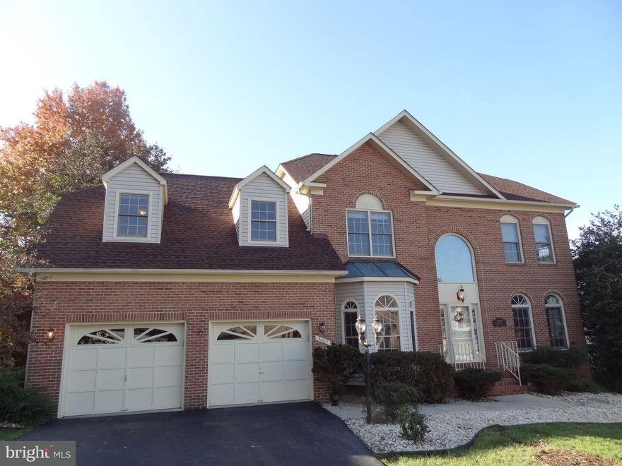 Desirable amenity-laden Clifton neighborhood with close-by public school pyramid.  Plenty of room to spread out in this 4,600+ square feet Colonial.  Skylit Morning and Family Rooms add quality living space to the already spacious Interior.  Main level Library with built-in bookcase makes the perfect in-home office. Gracious entertaining in the Living and Dining Rooms. Move the fun outside to the comfy Screen Porch that leads to large tiered Sun Deck. Treed Back Yard for romping and playing. THREE Baths UP help with busy mornings! Massive Master Suite with sitting and dressing area, dual walk-in closets and en-suite luxury Bath.  Princess-suite Bedroom enjoys its own private bath.  Smartly finished Lower Level offers a full Walk-Out Recreation Room, Fitness Room AND fifth Bedroom and fourth Bath! Ample Storage options in Garage and Basement. Fresh Interior Paint and new upper level Carpet! Move-in Ready Now!