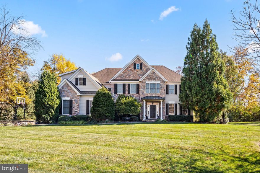Welcome to 16 Weightman Drive - a majestic property nestled at the end of a cul de sac in the highly coveted Fieldbrooke community of Malvern! This magnificent home boasts a brand new James Hardie exterior and with custom stone facade, oversized 3-car garage, extensive mature landscaping, and a backyard oasis designed with a summertime retreat in mind. With an abundance of windows and an open floor plan the home feels bright and airy throughout, with rooms flowing seamlessly into one another. The back yard features a heated salt chlorinator in-ground pool with retractable cover, built-in heated spa, slate patio/deck and a gas outdoor firepit with perfect privacy landscaping. The home's interior showcases extensive millwork and updated hardwood flooring throughout - the front-to-back grand foyer is framed by dramatic front staircase and abuts a formal living room and large formal dining room. The first floor also features a comfortable great room with gas fireplace and a sun drenched dining area with 2-story floor-to-ceiling windows offering panoramic views of the secluded backyard year-round. The chef-style kitchen includes granite countertops, oversized island, 6-burner gas cooking with griddle and grotto surround,  stainless-steel appliances, double ovens, farmhouse sink with breakfast bar, matching cabinet paneled Sub-Zero refrigerator, butler's pantry w/beverage fridge and sundrenched dining area with immediate access to the pool and patio. The first floor includes a convenient mudroom with built-in cubbies and access to the back stairs and oversized 3-car garage, a powder room, and a very spacious home office with custom paneled accent wall.  The second floor boasts a spacious owner's suite with tray ceiling,  sitting area, 2 walk-in closets with built in closet systems, and a sumptuous ensuite bath with whirlpool tub and upgraded tile shower.    There are four additional spacious bedrooms, Jack'n Jill and ensuite bathrooms,  a laundry room and computer nook round out the second floor.  You won't want to miss the spectacular finished basement with 9' ceilings, a separate home gym, full bath, generous game and TV area and walk up sliding glass doors to pool and patio.  Belgian block lined driveway. Additional amenities include 2-zone HVAC system, electric animal fence,  public water & sewer, in ground sprinkler system in the yard that has been professionally landscaped with stunning mature trees. This fabulous executive home is close to everywhere you want to be!   Top ranked Great Valley School District, central to public transport, major roads, quality shopping, fine dining, recreational parks, and walking trails. Call to schedule a showing today!