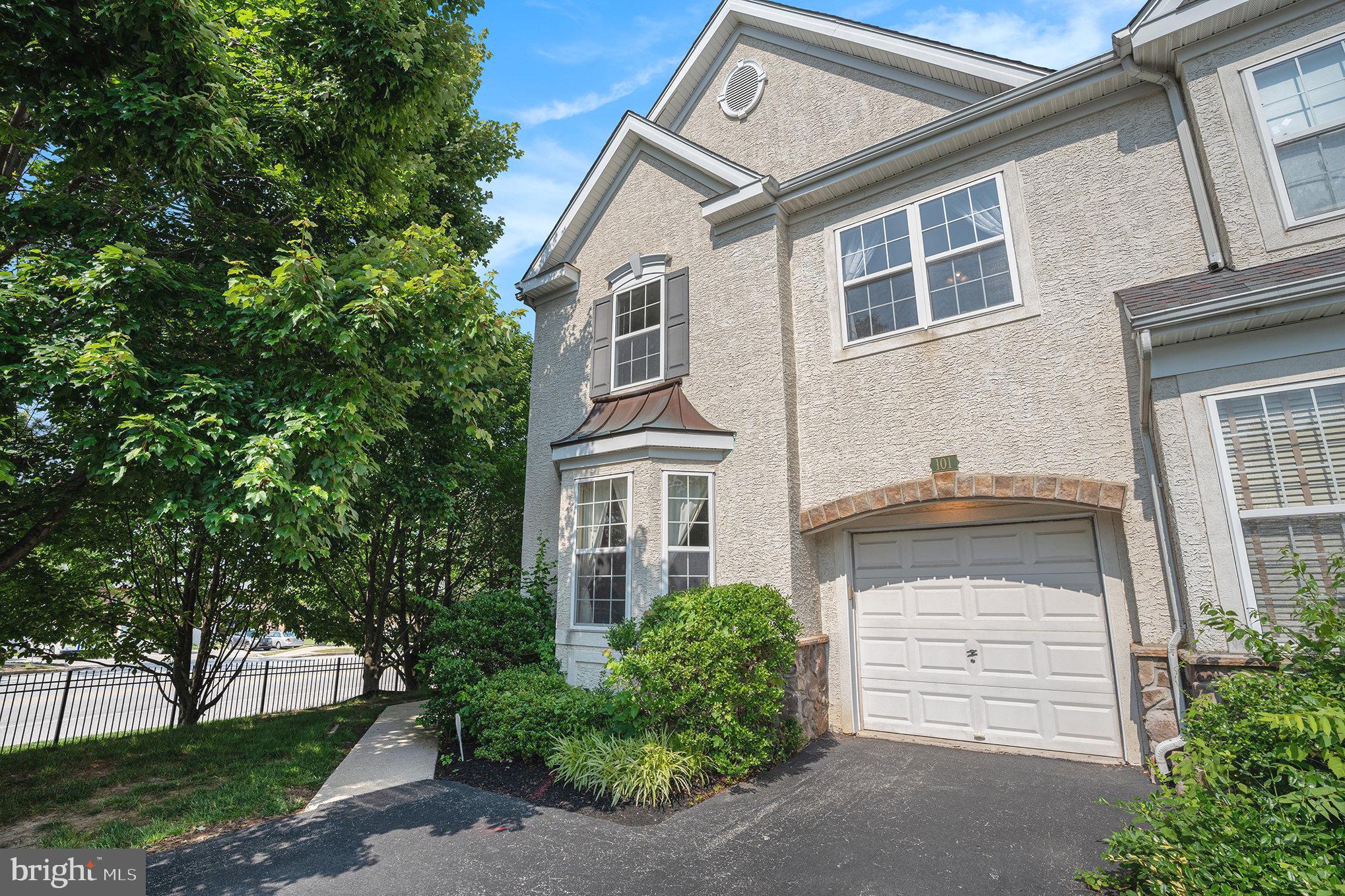 Beautifully maintained end-unit townhouse on a quiet cul-de-sac in the desirable Hill View Community. Features an open floor plan with hardwood floors, formal dining room with bay window, and large eat-in kitchen with island and sliders to a nice deck. Two-story family room offers abundant natural light, a gas fireplace, and custom motorized blinds. Living room with second bay window and first-floor powder room. Upstairs, the spacious primary suite includes a walk-in closet and large bath with jetted tub, double vanity, and stall shower. Two additional bedrooms, hall bath, and second-floor laundry. Finished basement with half bath and storage. Newer roof. Convenient to Routes 476, 76, 202, shopping, and Plymouth Community Center.