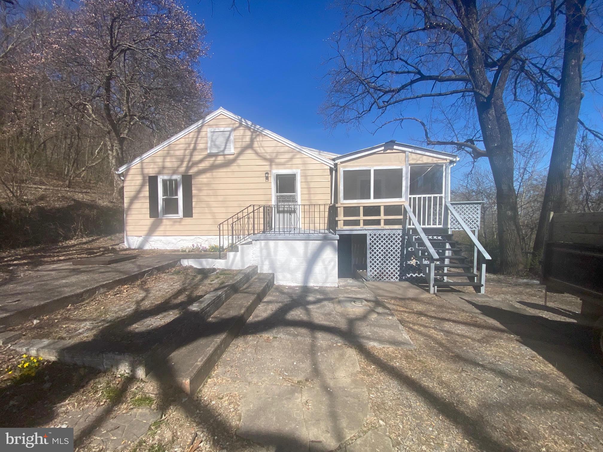 Please note this rental is for the upper floor ONLY. There is a separate unit in the lower level that is rented. This lovely 2 bedroom 1.5 bath home has so much to offer! You have a large dining room with hardwood floors adjacent to your spacious kitchen. The huge living room features a wall of windows to let in all that beautiful sunlight. If that's not enough for you there is a lovely screened in porch to enjoy the outdoors without the bugs! There are 2 generously sized bedrooms with large closets. There is a 3rd room that could be used as an office or 3rd bedroom. The full bath features a single bowl vanity for extra storage and a tub/shower. You will also have a mudroom with cabinet storage and laundry hook-ups. The home is surrounded by lovely mountain views. The landlord will allow tenant the use of 10 acres of land next to the property. This property has so much to offer - schedule your showing today!