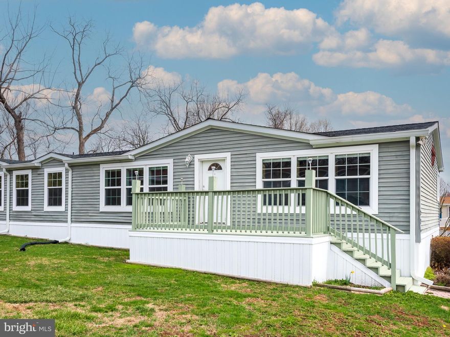 Welcome to 276 Deer Run Drive, nestled in scenic Honey Brook. This beautifully maintained double-wide mobile home offers comfort, space, and convenience all in one. Step inside to an expansive family room featuring built-in cabinetry—perfect for both storage and stylish display. Just off the family room, the bright and functional kitchen connects seamlessly to a cozy breakfast area, ideal for casual dining. To the right, you’ll find the spacious primary bedroom, filled with natural light from large windows. The adjoining en-suite bathroom includes a double vanity, a stall shower, and a soaking tub. Down the hall to the left are three additional well-sized bedrooms, each sharing a generous full bathroom. A dedicated laundry area and mudroom with exterior access complete the home's thoughtful layout. Outside, a small storage shed at the rear of the property provides added convenience. Enjoy the peaceful surroundings and picturesque landscape of Honey Brook, all while being just minutes from major highways and the amenities of Chester County. Don’t miss the chance to make this tranquil retreat your new home!