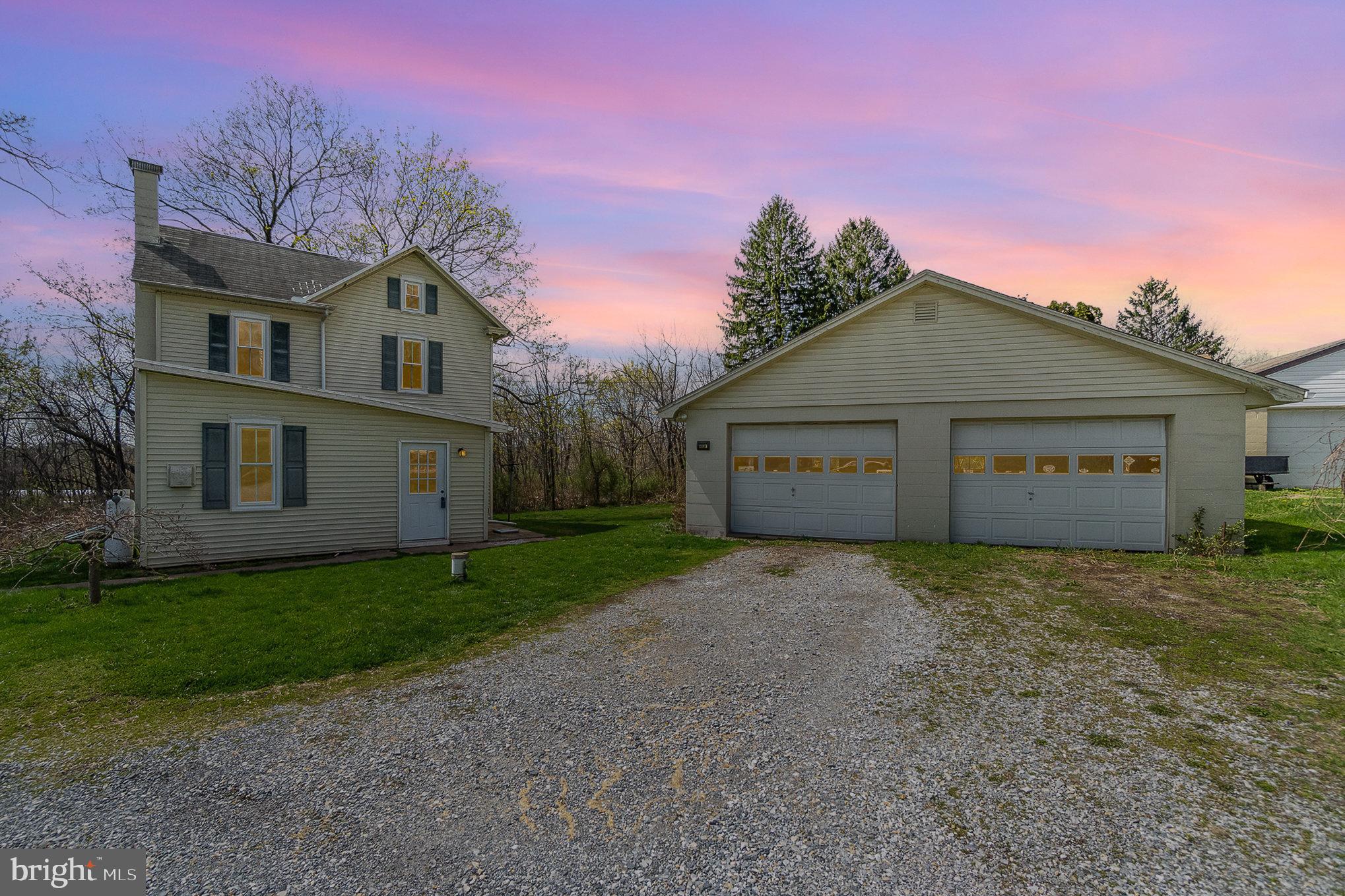 Stop your scroll - 2392 Mountain Road is an opportunity not to miss! This detached home in a rural setting is sure to please. Featuring an updated first floor laundry with washer and dryer, new kitchen with open shelfing, soft close drawers, gas stove and refrigerator included. Upstairs, enjoy a renovated bathroom with shiplap and tile surrounding the shower with a rainfall showerhead, and 3 bedrooms will fit your fancy and create the home you've been searching for. Park two cars inside or own a hobby hub! Either way, the detached garage has a lot of potential. Spring right into home, this property is ready for immediate occupancy!