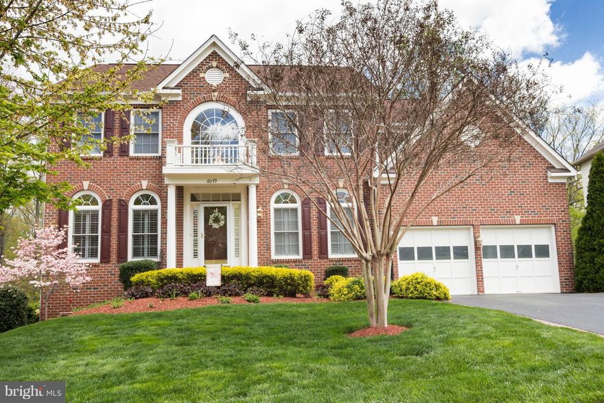 Impeccably kept home in commuters' dream location. Freshly painted, gourmet kitchen w/ granite & ss appliances, hardwood throughout main level, open floor plan,huge master w/ balcony, upstairs laundry, 6 zone sprinkler system in manicured lawn, Invisible Fence, Gorgeous screened porch, composite deck, and brick patio backing to private treed lot, walkout basement, tons of custom details to see.