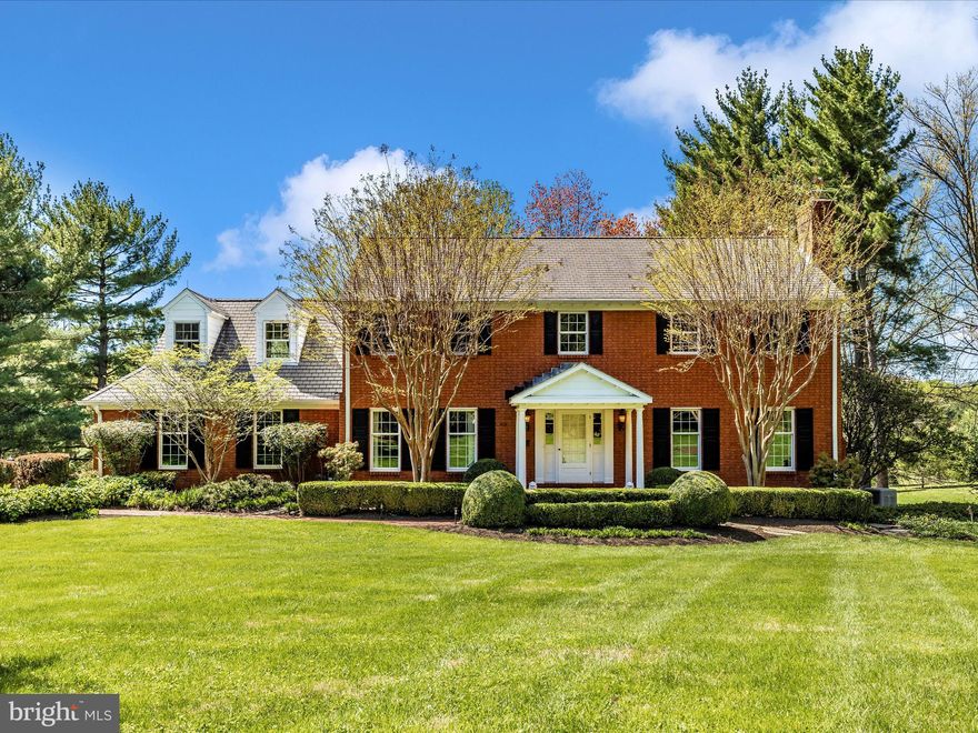 ***NEW PRICE*** Welcome to this stunning 2.08-acre executive brick colonial estate, showcasing a classic Williamsburg brick pattern and offering an exceptional blend of luxury, functionality, and charm. Located within the coveted Woodmark community and close to major commuter routes, this meticulously designed property is a true gem.
Upon entering, you'll be greeted by a grand marble foyer that sets the tone for the elegance within. The main level features a sunken family room adorned with a traditional Jotul wood stove, creating a cozy and intimate atmosphere perfect for gatherings. Adjacent to the family room is a formal living area boasting a decorative fireplace, adding character and warmth to the space.
The heart of the home is the open kitchen, complete with stylish Silestone countertops and true hardwood floors that extend throughout, adding beauty and durability to the living spaces. A main-level laundry room with a deep sink offers convenience and functionality.
Upstairs, you'll find five well-appointed bedrooms, including a luxurious master suite, each offering comfort and privacy. The upper level boasts two full bathrooms featuring radiant heat flooring in second bath, providing a touch of luxury.
Descend the cherry staircase to the finished lower level, where you'll discover additional living space ideal for entertainment or relaxation. This lower level features a full bathroom with radiant heated floors, offering comfort and convenience. The walk-out access provides seamless indoor-outdoor flow and easy access to the expansive backyard.
Additional features include a central vacuum system and an intercom system for enhanced convenience and communication throughout the home. Entertain outdoors on the 24x30 patio surrounded by beautiful hardscaping, or unwind in the 22x17 screened-in porch with mahogany decking and Velux retracting blinds, offering a tranquil retreat for relaxation.
The property also includes an oversized paved driveway leading to a side-entry garage with updated flooring, providing ample parking and storage. Additionally, there's a versatile 16x24 carriage house perfect for storage or potential additional living space.
Located in the sought-after Woodmark community, this estate offers both privacy and accessibility, with easy access to major commuter routes.
Don't miss the opportunity to make this exceptional executive brick colonial estate your own. Schedule a tour today and experience luxury living in the heart of the Woodmark community!