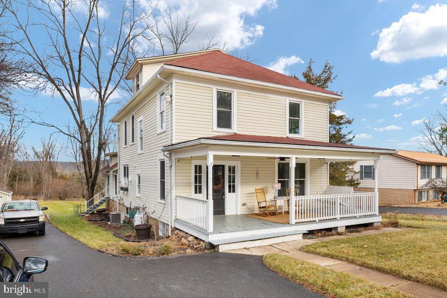 **BACK ON THE MARKET AT NO FAULT TO SELLERS!** Over 2,000 square feet of history and heart, quietly nestled within one of the area’s most treasured communities. Just five minutes from downtown Wardensville, where life unfolds at an easy pace—morning coffee runs, afternoons at the town park, weekends at the organic farmers market, and evenings wandering local bookstores and shops. This is a historic and highly desired location, where character is woven into the architecture and neighbors still wave as they pass by. And when the day calls for a little more hustle, Winchester, Virginia is only 30 minutes away. Here, you enjoy the best of both worlds—the charm and convenience of being in Wardensville, paired with the privacy of your own backyard retreat. This spacious and solid 4-bedroom, 2-bath home is a true slice of history, offering rooms that feel grounded, welcoming, and full of stories. Original wood floors run throughout, carrying the warmth and patina of generations past, while timeless molding—preserved from the home’s earliest days—frames each space with quiet elegance. A built-in curio cabinet stands as a beautiful reminder of the craftsmanship of its time, perfect for displaying treasured pieces or everyday keepsakes. Tucked away on the back porch is a hot tub, creating a peaceful space for evening relaxation or entertaining under the stars. With two screened-in porches, a large front porch, and generous outdoor areas, there’s no shortage of places to slow down and soak it all in.
Inside, surprises await—like a workshop basement accessed through a hidden door… can you find it? A large unfinished attic offers ample storage now, or the potential to become a quiet escape, studio, or artist’s dream space. Throughout the home, you’ll feel the strength of great bones and the warmth of a time gone by, seamlessly paired with the comfort of modern living. This home doesn’t just stand—it invites you in, wrapping you in history, craftsmanship, and possibility. A rare and precious time capsule, ready for its next chapter. Schedule your appointment today and experience it for yourself. 

During ownership the Sellers have done/added the following:
 -House rewired in 2021
-All major appliances less than 5 years old 
-Instant on-demand hot water heater less than 5 years old 
-New 300 sq. Ft. back deck
-7-person hot tub 
-Historic Hardwood floors refinished
-New 8 x 16 shed
-Kitchen, bathrooms newly remodeled 
-Original clawfoot tub and sink
-New lighting/fan fixtures 
-Custom built kitchen an dinning room table