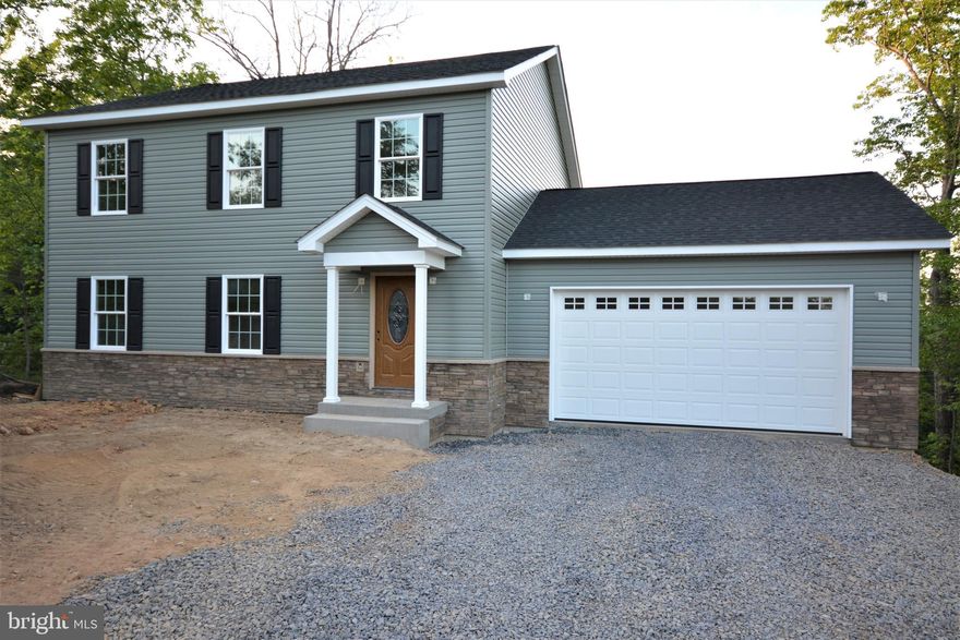 ***NEAR COMPLETION*** - Great Commuter Location - Approx. 7 miles to I-66 and Approx. 1 mile to the George Washington National Forest (hiking, fishing and camping). Home offers 1+ acres, 2 car garage, recessed lighting, large kitchen with island, laundry room on main level, living room (approx. 15 x 20) has gas fireplace, primary bedroom (approx. 15 x 17) has 2 separate closets, primary full bath has double sinks and  ceramic tile shower and floor.  Basement has rough in plumbing for full bath and french door. No dirt roads! All paved state maintained roads to home! Private Community Lake! So many things to enjoy in the area like the Appalachian Trail, Shenandoah River, Canoeing, Skyline Drive and golf courses.  Make your appointment today to view this home.