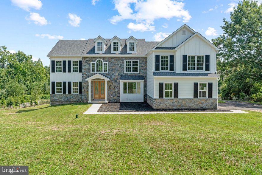 We are so close to completion! This stunning new construction home, nestled on 1.25 acres, is ready for its first owners. Located in the award-winning Central Bucks East School District, this home offers modern amenities and is designed with entertaining in mind!

As you step into the grand two-story entrance, you'll be greeted by an impressive staircase leading into the family room, complete with one of two electric fireplaces. The open floor plan invites customization, with buyers having the opportunity to select the main flooring and kitchen countertops for a personalized touch. The kitchen boasts a massive island that spans nearly the full length of the space, offering ample room for cooking and entertaining. It includes an impressive amount of cabinets and a walk-in pantry conveniently located right off the kitchen. Completing the lower level is the formal living room and dining room. 

This home features 4 spacious bedrooms and 4.5 bathrooms. Two conjoining staircases lead to the upper level from the entrance and the kitchen. The primary suite spans an impressive 1,000 square feet, featuring two massive walk-in closets and a secret bonus closet. The convenience of a second-floor laundry room, equipped with a washer and dryer, enhances the home's layout. 

The finished 2,000-square-foot basement offers a sliding door walkout, a movie theater room, a bar area, an entertainment area with electric fireplace, and an additional room perfect for an office or home gym. A full bathroom and a massive storage area, complete with a tankless hot water heater and fire suppression system, add practicality and peace of mind.

This property is surrounded by picturesque homes on a private drive.  Your home includes an attached three car garage and mud room.  With everything you need right at home, you may never want to leave. But if you do, the proximity to Doylestown and New Hope ensures all the amenities and attractions of these vibrant towns are within reach.

Don't miss the chance to make this spectacular property your own!
