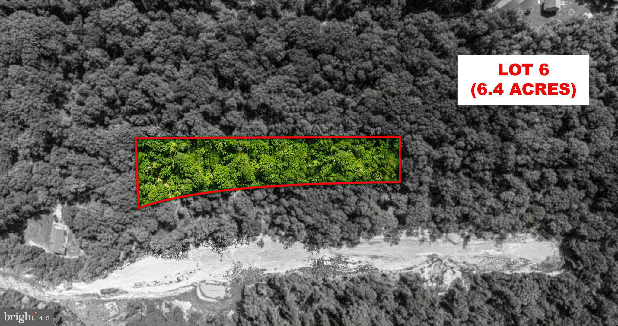 Don't miss this opportunity to build the home you've always wanted in a stunning natural setting. Contact us today to schedule a viewing and start the journey toward your own woodland retreat. Welcome to your own slice of paradise! Nestled in the heart of nature, this 6.402-acre wooded lot offers the perfect canvas for your dream home. Located in a serene community, this property combines the best of both worlds - the privacy and seclusion of a wooded retreat with the convenience of a prime commuter location. Perced lot ready to build! Can't find these prices anywhere! Road is going in. Buy the lot sit on it, buy the lot and use one of our preferred builders, buy the lot and bring your own builder, or buy the lot and build yourself