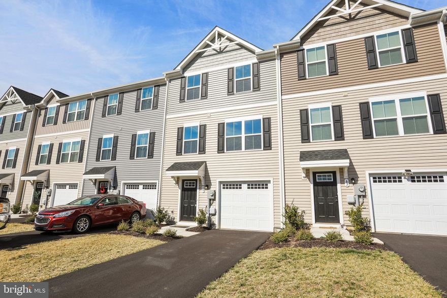 OPEN HOUSE TODAY : 08/03 - From 5pm to 6 PM. FOR IMMEDIATE RENT! Located in the community of The Lakes at Martinsburg. This newly built (2020) townhome features 3 Bedrooms, 2.5 Baths. Perfect commuter location with easy access to Route 9 and I-81. The highlight of this townhome includes an open concept floor plan between the living/kitchen/dining on the main level. In addition to an on-demand hot water system, this property comes with the added advantage of a water softener, a backsplash and pantry in the kitchen, a reading nook located on the walk-in level, and a vinyl fence and patio in the backyard for privacy and entertaining. Smart home features include a Nest Thermostat, front and rear Ring cameras, and a smart garage door opener. The finished rec room could easily be used as a multi-purpose space like an additional small bedroom or office space. Front side access Attached Garage with Long Driveway for parking your cars. Gas community. Washer and dryer in unit. Pets are allowed. Security deposit and first-month rent upfront. Call to schedule your private tour!